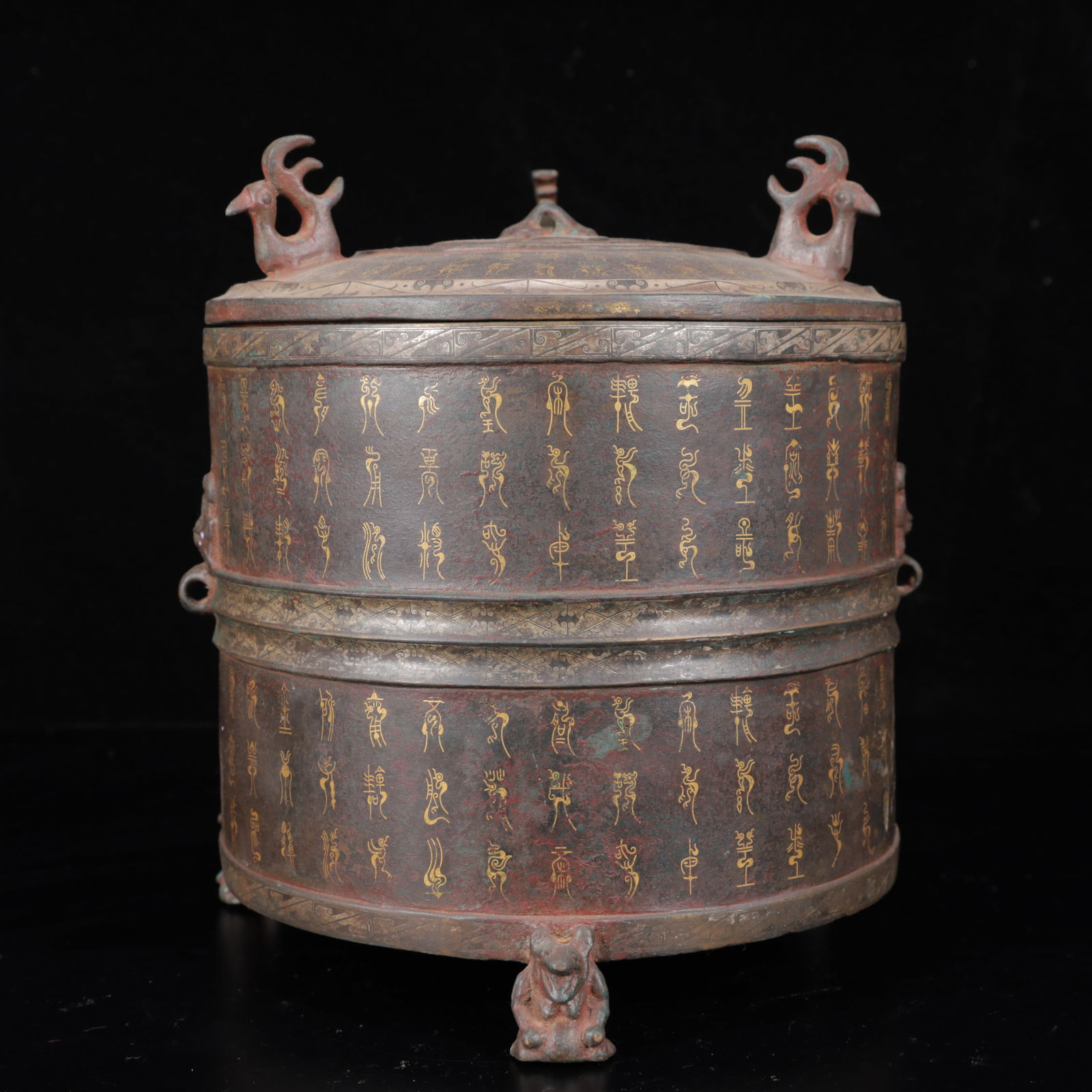 An Archaic Bronze Inlaid Gold and Silver Double-Ears and Tripod Censer,With Inscription: An Archaic Bronze Inlaid Gold and Silver Double-Ears and Tripod Censer,With Inscription,The Warring States period in China,Size:8.3inx8.7in,Weight:3900g 铜错金银双耳