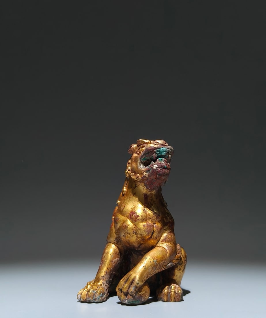 An Exquisite Gilt Bronze Lion Ornament: An Exquisite Gilt Bronze Lion Ornament,Qing Dynasty, China,Size:5.5inx4.3inx3.5in 铜鎏金狮子摆件,中国清代