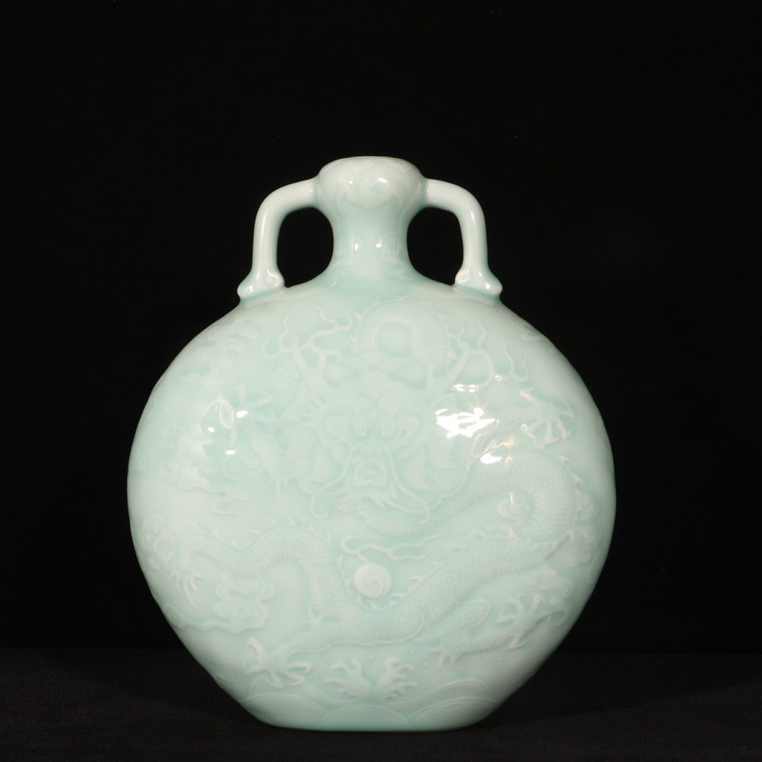 An Exquisite Celadon Glazed Auspicious Cloud and Dragon Pattern Double-Ears Vase (1 of 9)