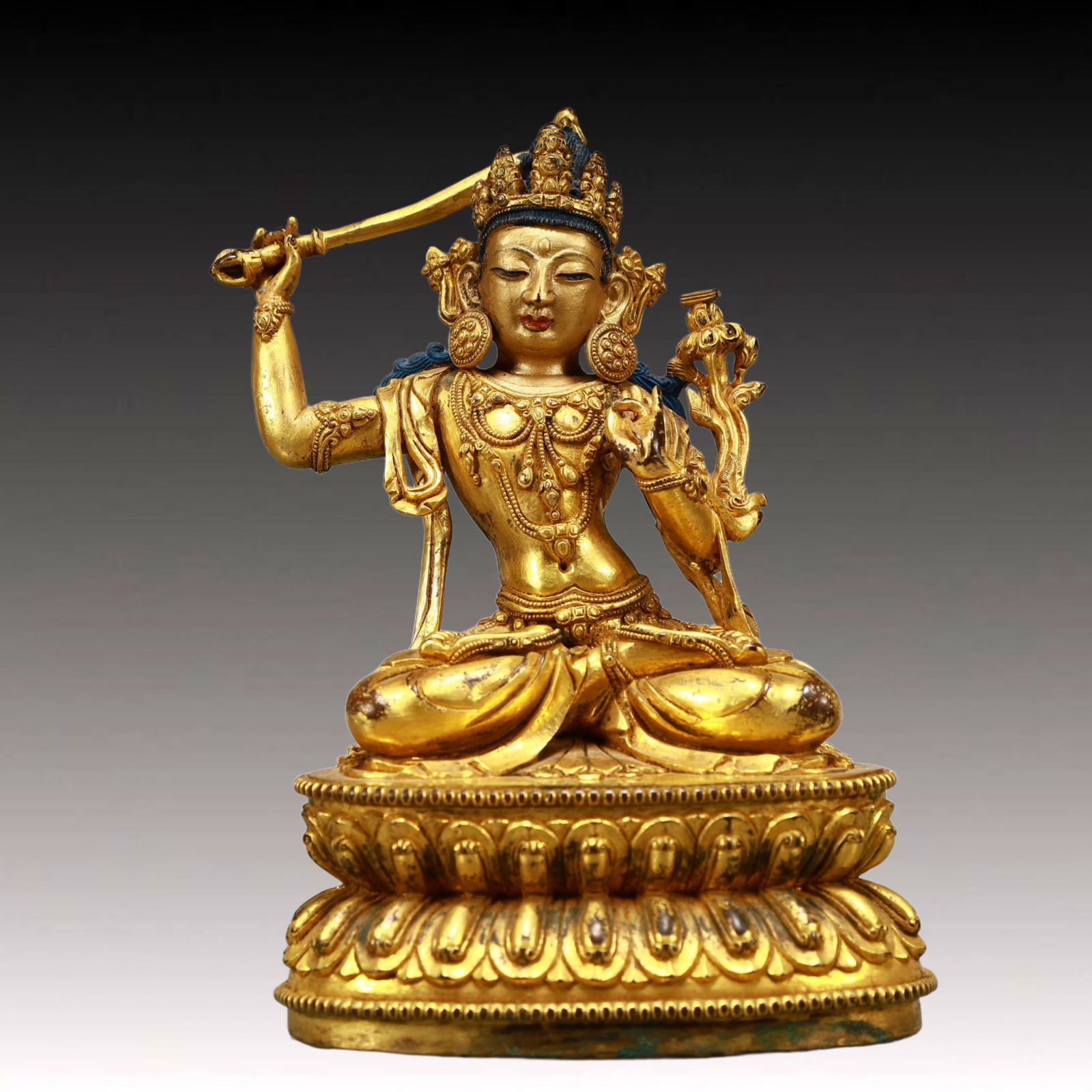 A Solemn Gilt Bronze Statue of Manjusri: A Solemn Gilt Bronze Statue of Manjusri,Ming Dynasty, China,Yongle Six-character Mark,Size:4.5inx3inx7.1in,Weight:1200g 铜鎏金文殊菩萨像,中国