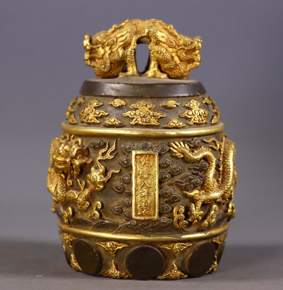 An Exquisite Gilt Bronze Auspicious Cloud and Dragon Pattern Chime (1 of 9)