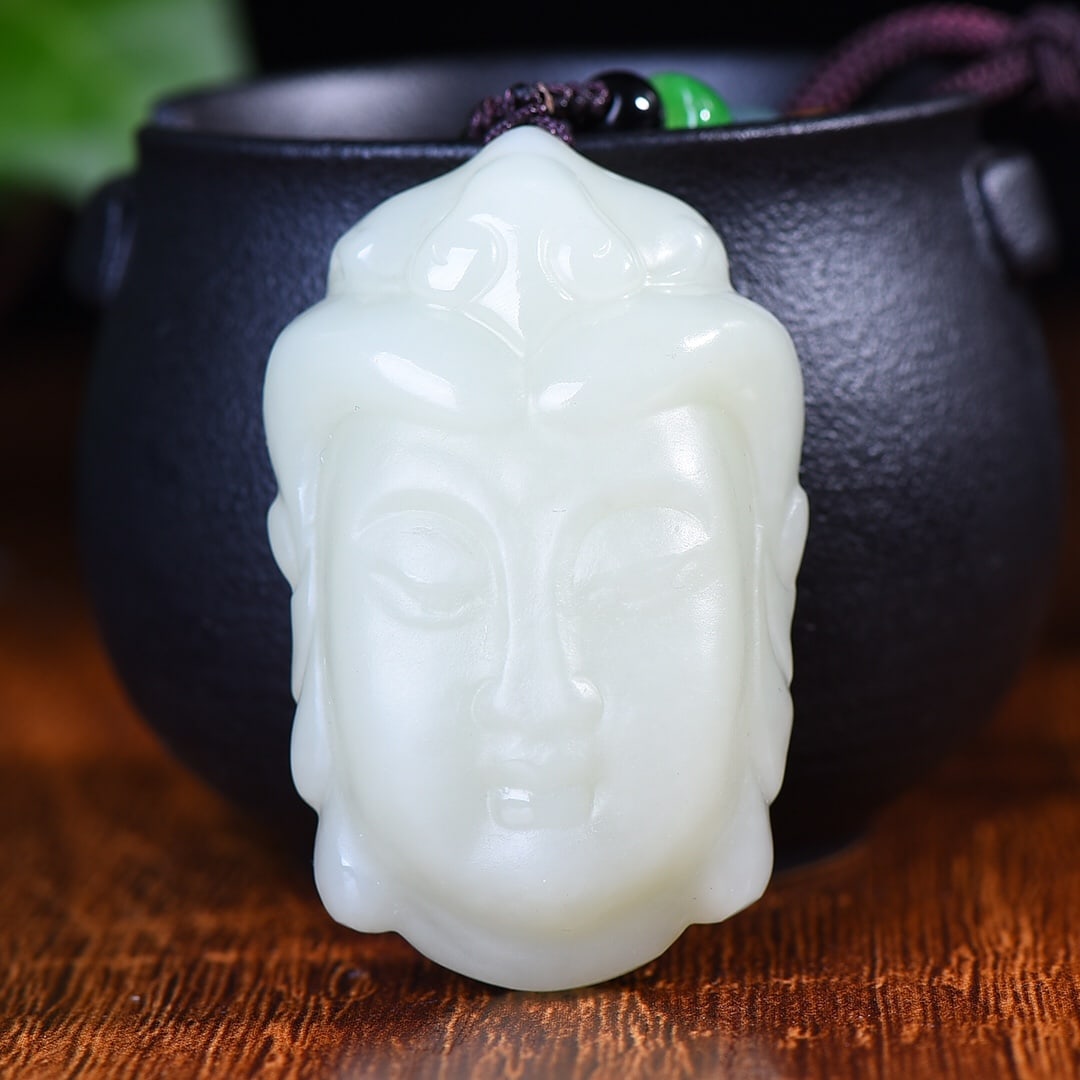 An Exquisite White Jade Avalokitesvara-head Pendant: An Exquisite White Jade Avalokitesvara-head Pendant,Size:34mmx54mm (寓意)（立体大观音头）精细雕工 高端&#