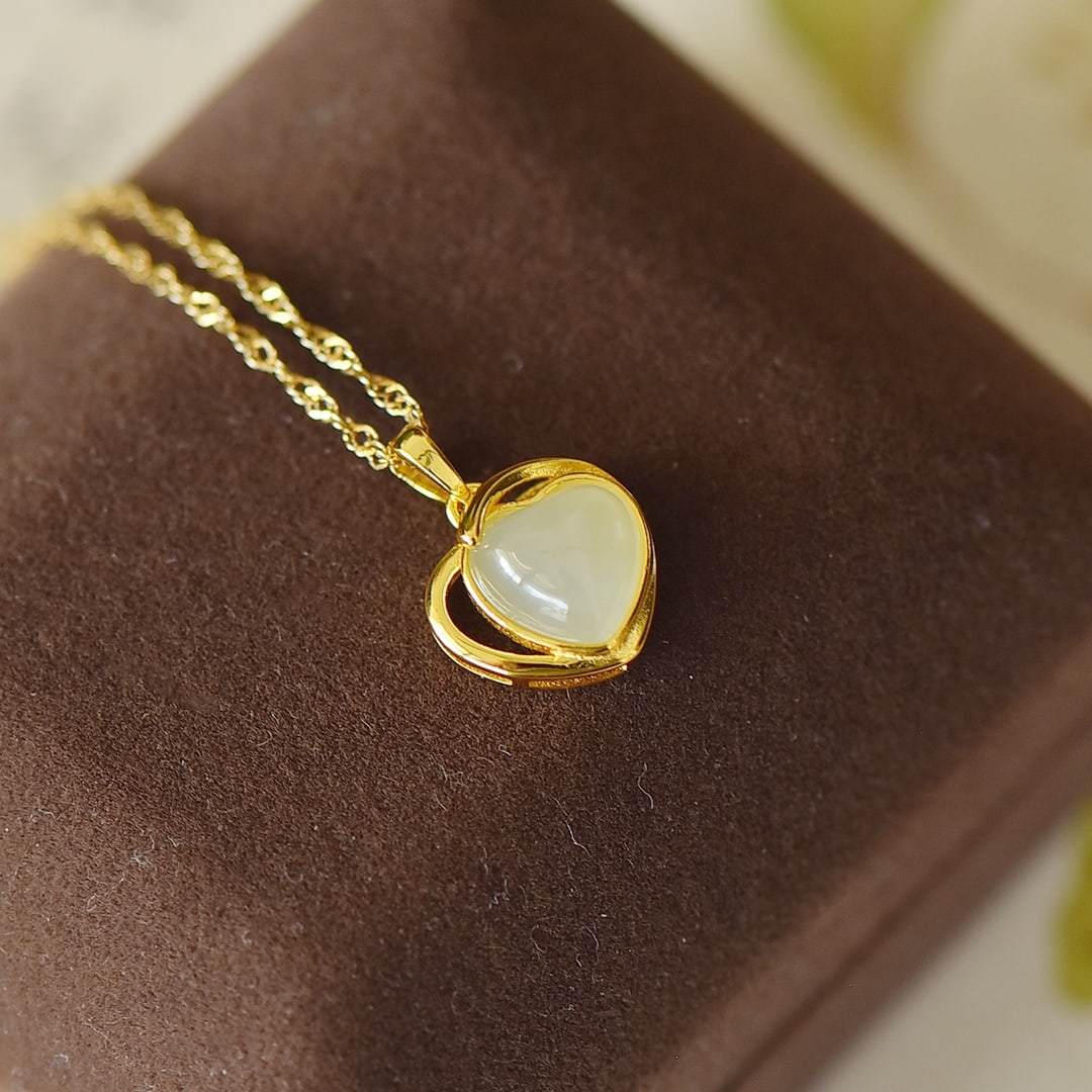 An Exquisite Sterling Silver-Gold Plated Inlaid White Jade Pendant: An Exquisite Sterling Silver-Gold Plated Inlaid White Jade Pendant, 纯银镀金镶白玉吊坠