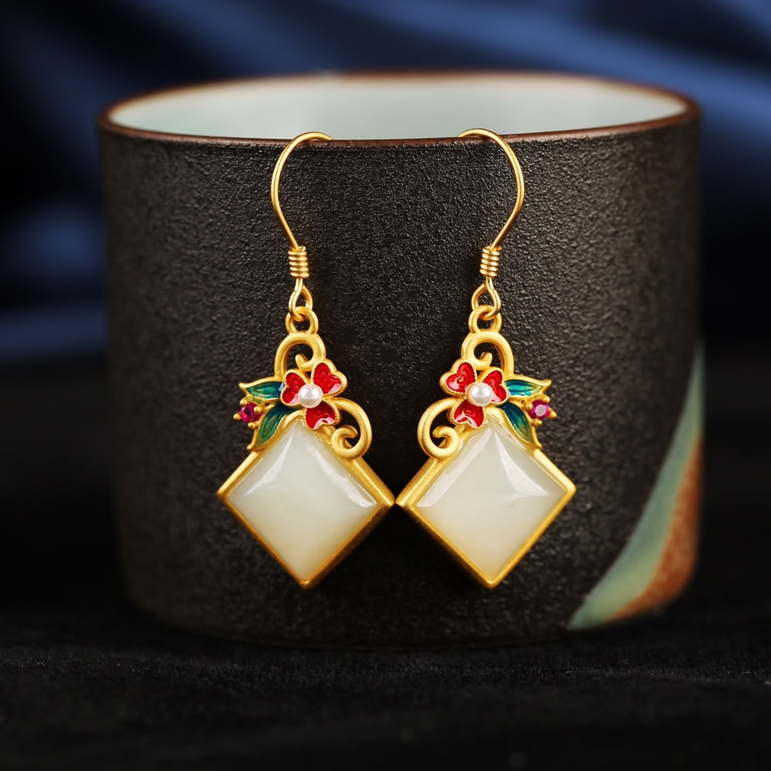 A Pair of Exquisite Sterling Silver-Gold Plated Inlaid White Jade Earrings: A Pair of Sterling Silver-Gold Plated Inlaid White Jade Earrings , Size :10mmx10mms 一对纯银镀金镶白玉耳环,尺寸:10mmx10mm