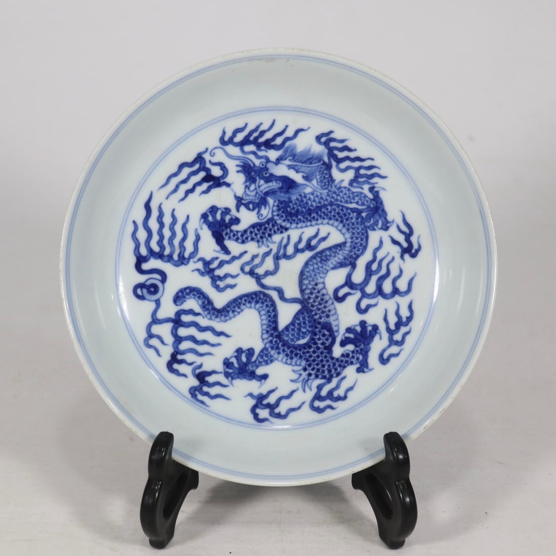 An Exquisite Blue and White Auspicious Cloud and Dragon Pattern Plate: An Exquisite Blue and White Auspicious Cloud and Dragon Pattern Plate,Qing Dynasty,China,Guangxu Six-character Mark,Size:6.7in 青花祥云龙纹盘,中国
