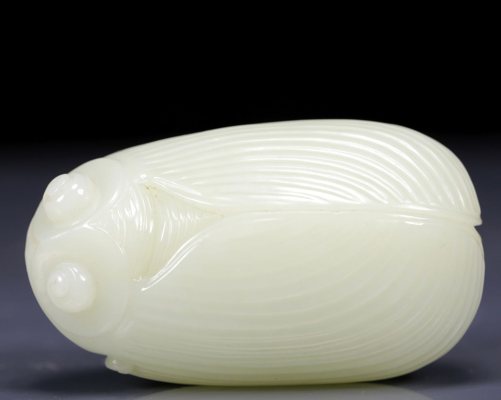 An Exquisite White Jade Cicada Ornament (1 of 6)