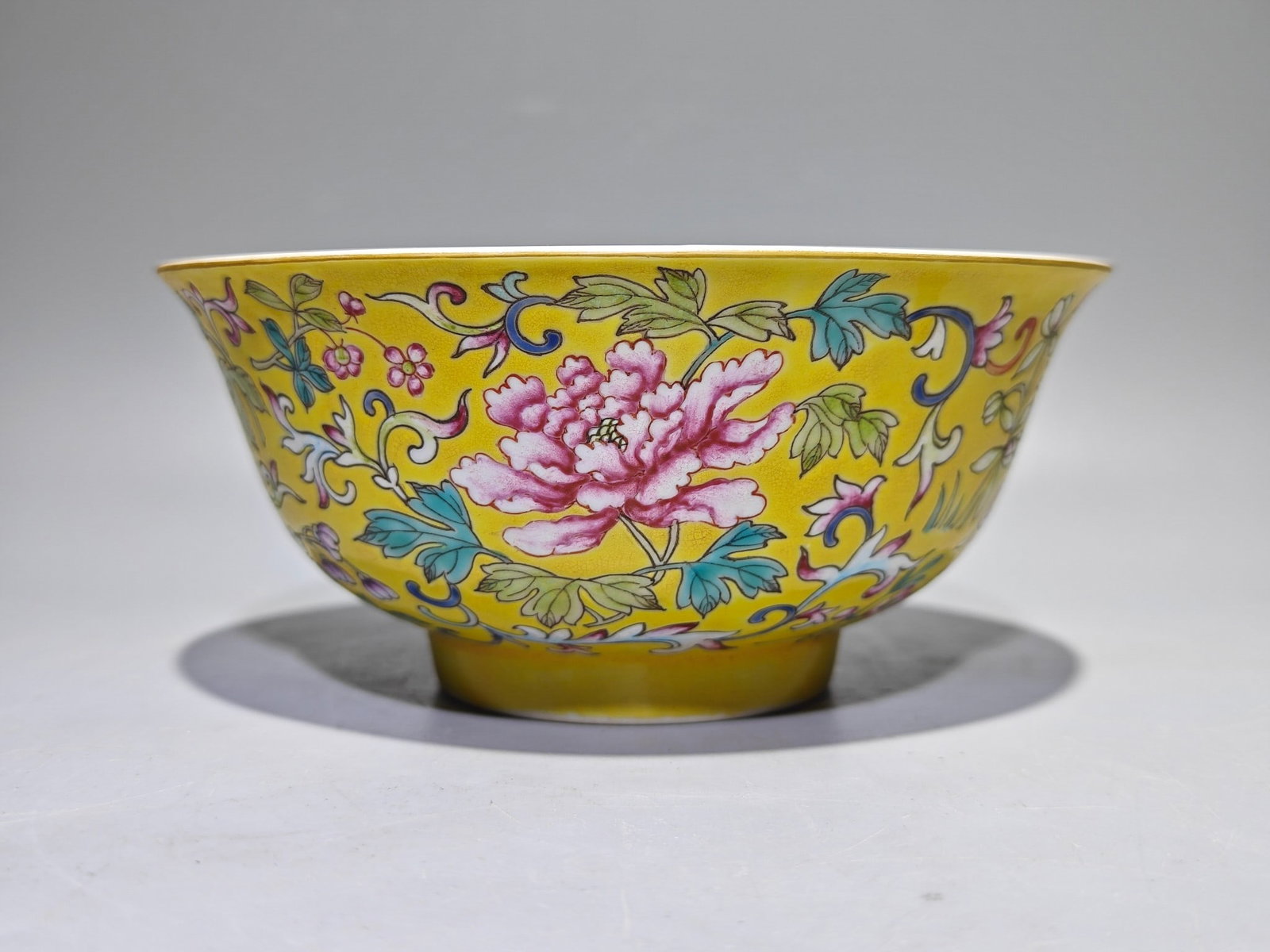An Exquisite Famille-Rose Yellow Ground Flower Pattern Bowl (1 of 9)