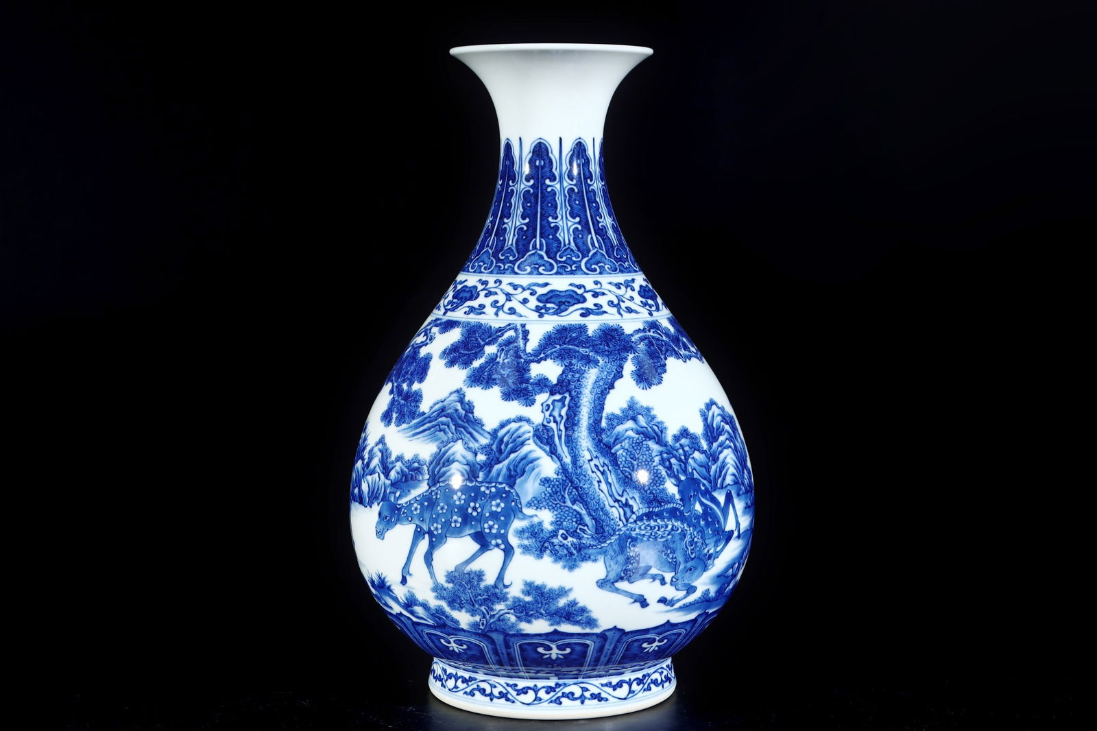 An Exquisite Blue and White Pine and Deer Pattern Vase: An Exquisite Blue and White Pine and Deer Pattern Vase,Qing Dynasty,China,Qianlong Six-character Mark,Size:12.6inx7.9in 青花松鹿纹瓶,中国清代