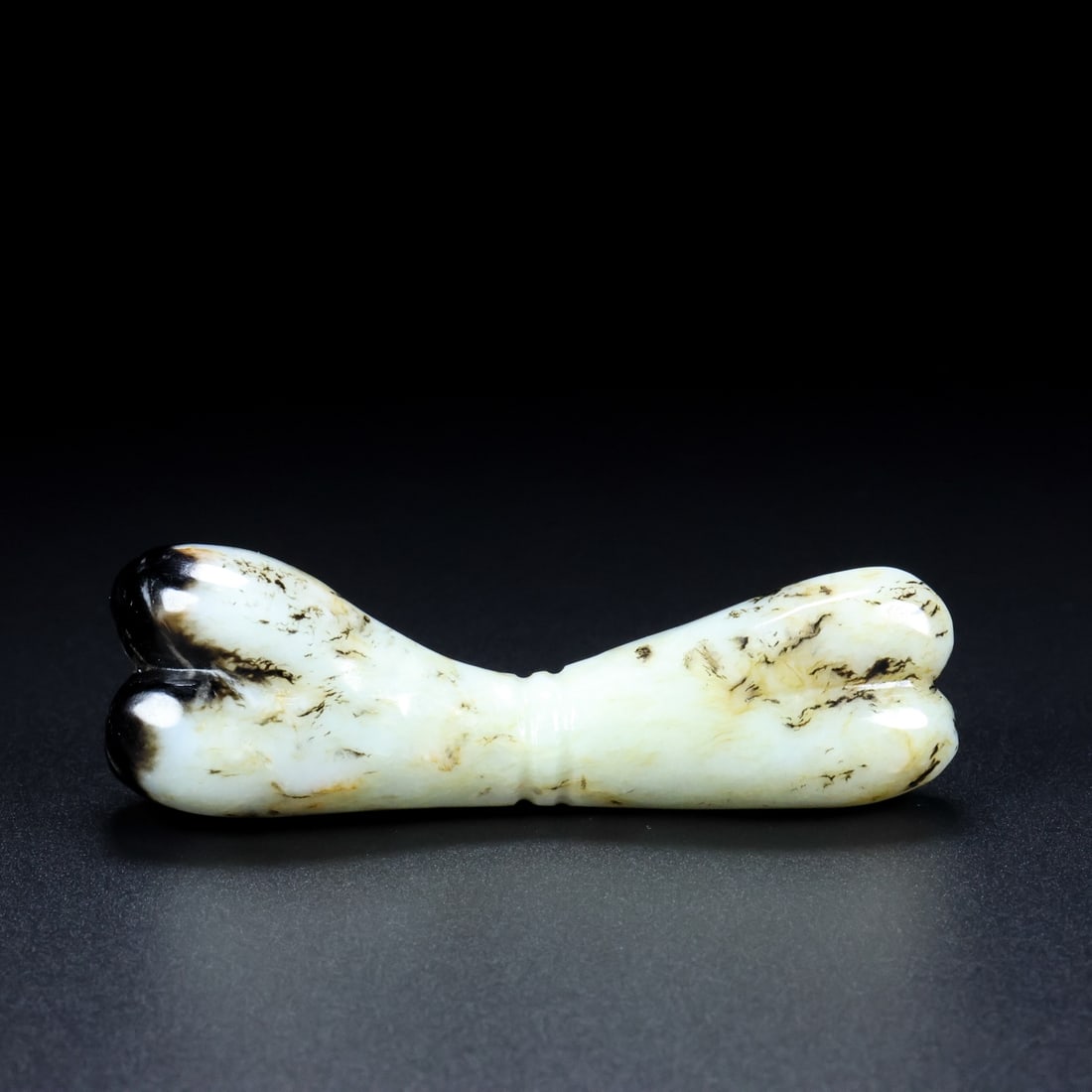 An Exquisite White Jade Bone Ornament (1 of 9)
