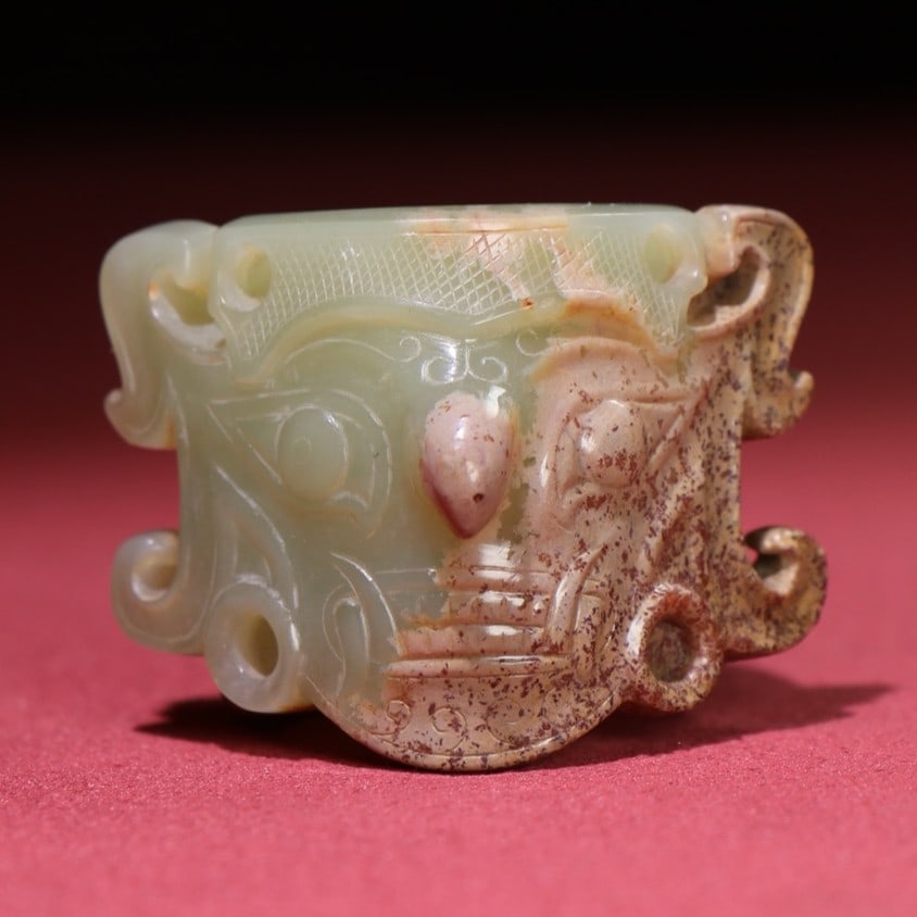 An Exquisite White Jade Figure-Face Pattern Thumb Ring (1 of 8)