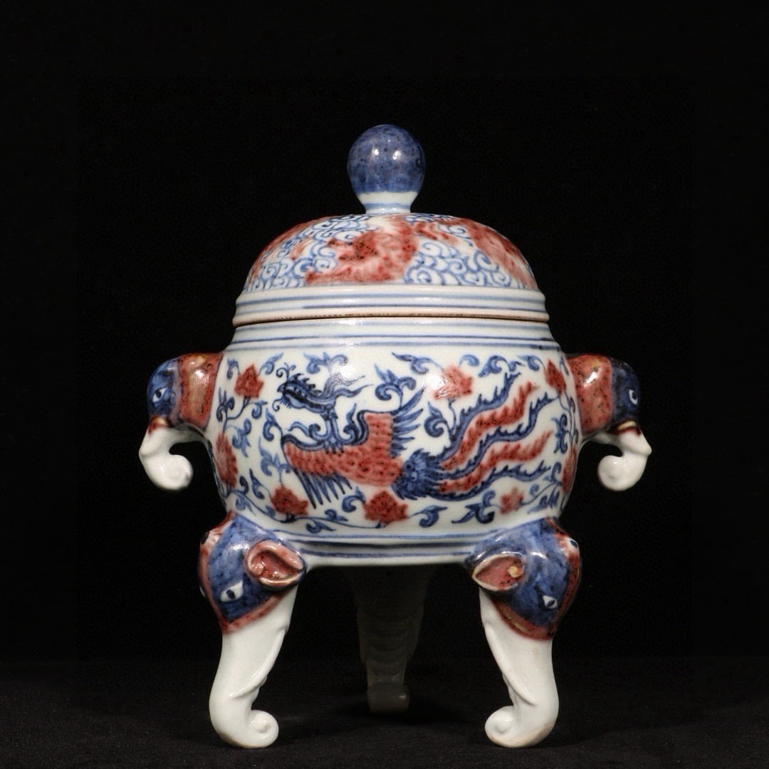 An Exquisite Blue and White Underglaze-Red Lotus and Phoenix Pattern Elephant-Ears Tripod Censer: An Exquisite Blue and White Underglaze-Red Lotus and Phoenix Pattern Elephant-Ears Tripod Censer,Ming Dynasty,China,Xuande Six-character Mark,Size:7.9inx6.3in 