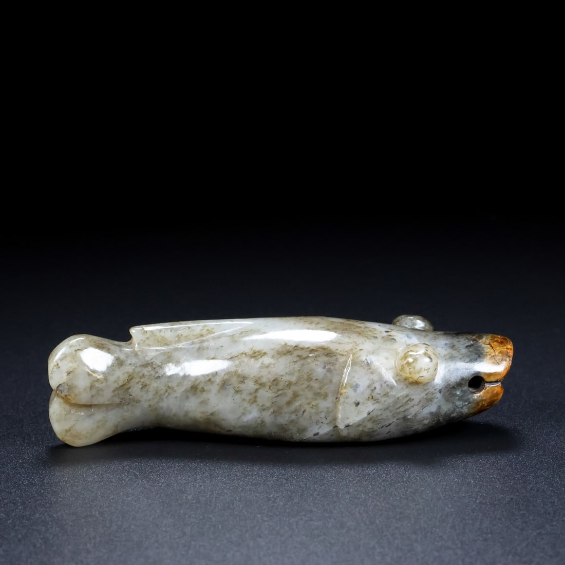 An Exquisite White Jade Fish Ornament: An Exquisite White Jade Fish Ornament,Qing Dynasty,China,Size:4.1inx1.2inx1in,Weight:136g 白玉鱼摆件,中国清代