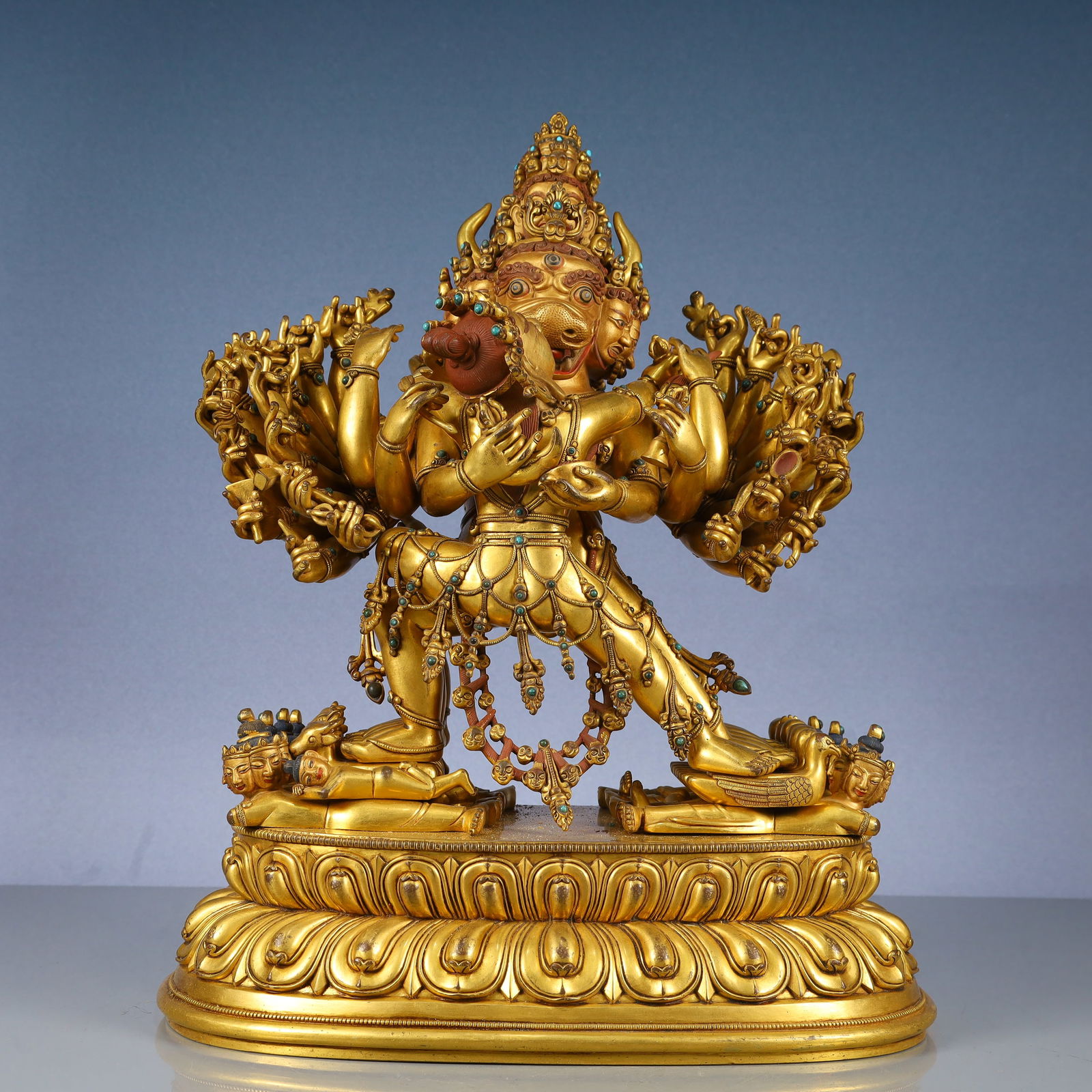 A Solemn Gilt Bronze Statue of Yamantaka,Inlaid Turquoise: A Solemn Gilt Bronze Statue of Yamantaka,Inlaid Turquoise,Qing Dynasty, China,Size:12.2inx7.9inx15.7in,Weight:16800g 铜鎏金大威德金刚像,嵌&#