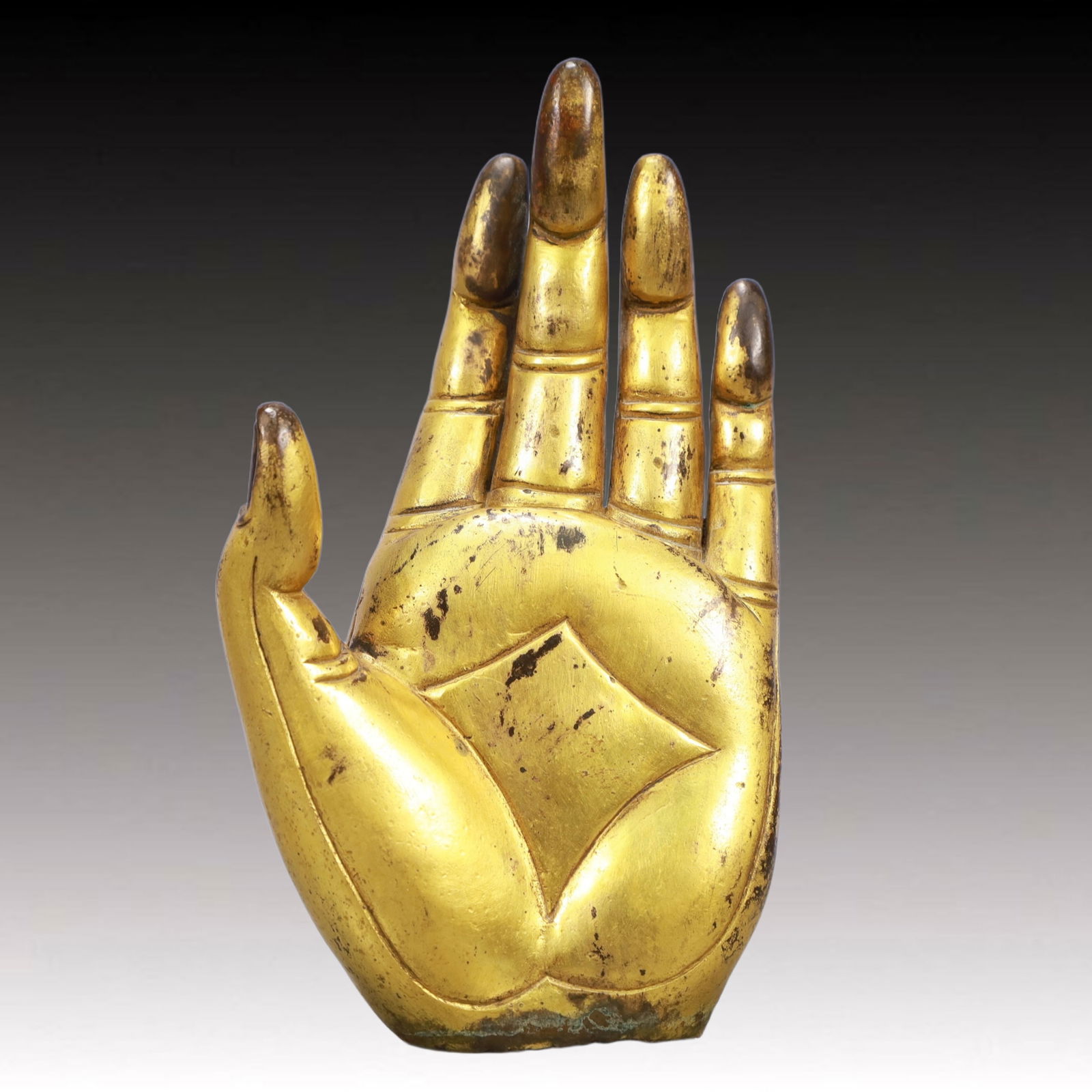 A Rare Gilt Bronze Buddha's hand Ornament (1 of 5)