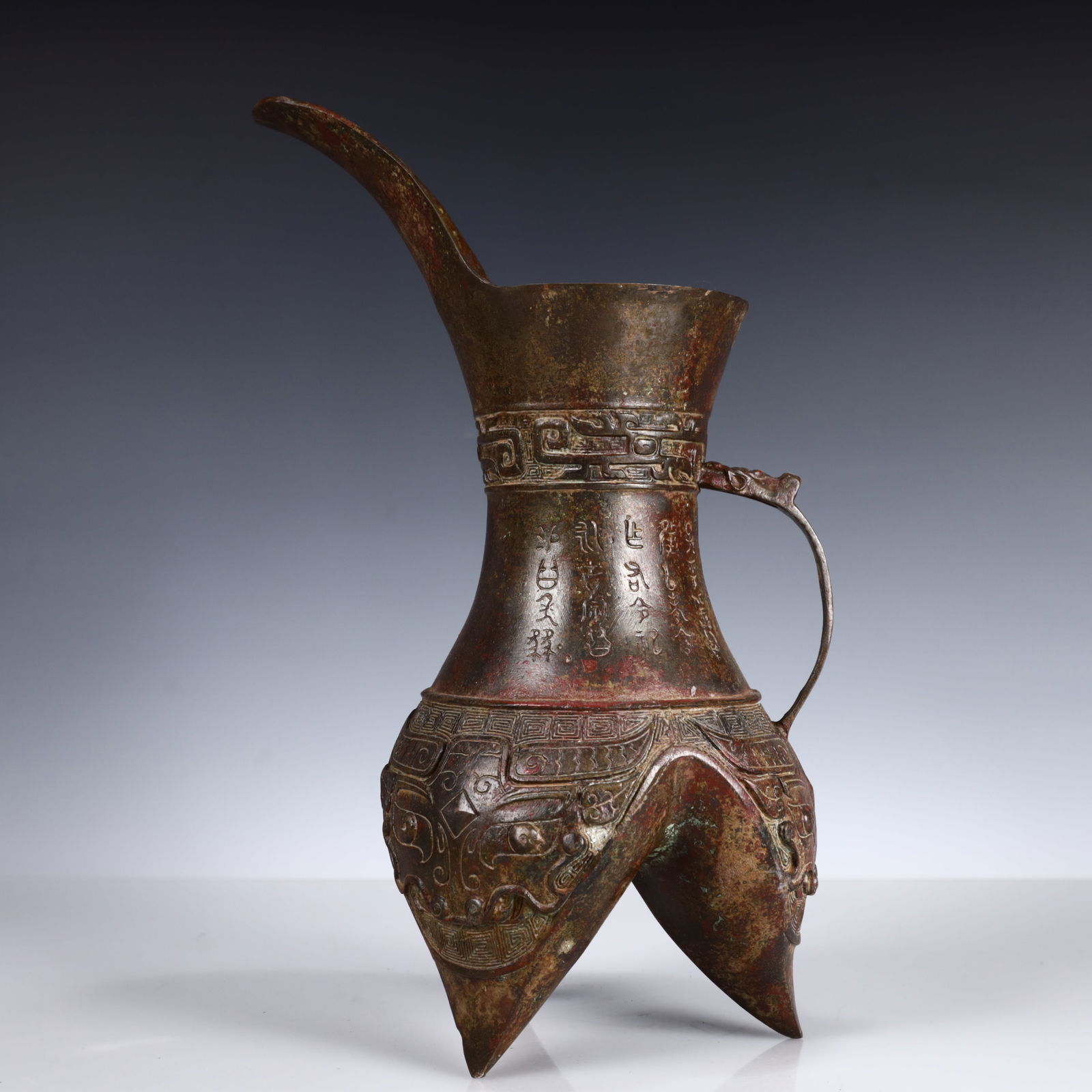 A Rare Bronze Beast-Face Pattern Flagon,With Inscription: A Rare Bronze Beast-Face Pattern Flagon,With Inscription,W.Zhou,China,Size:7.1inx7.1inx13in,Weight:1850g 