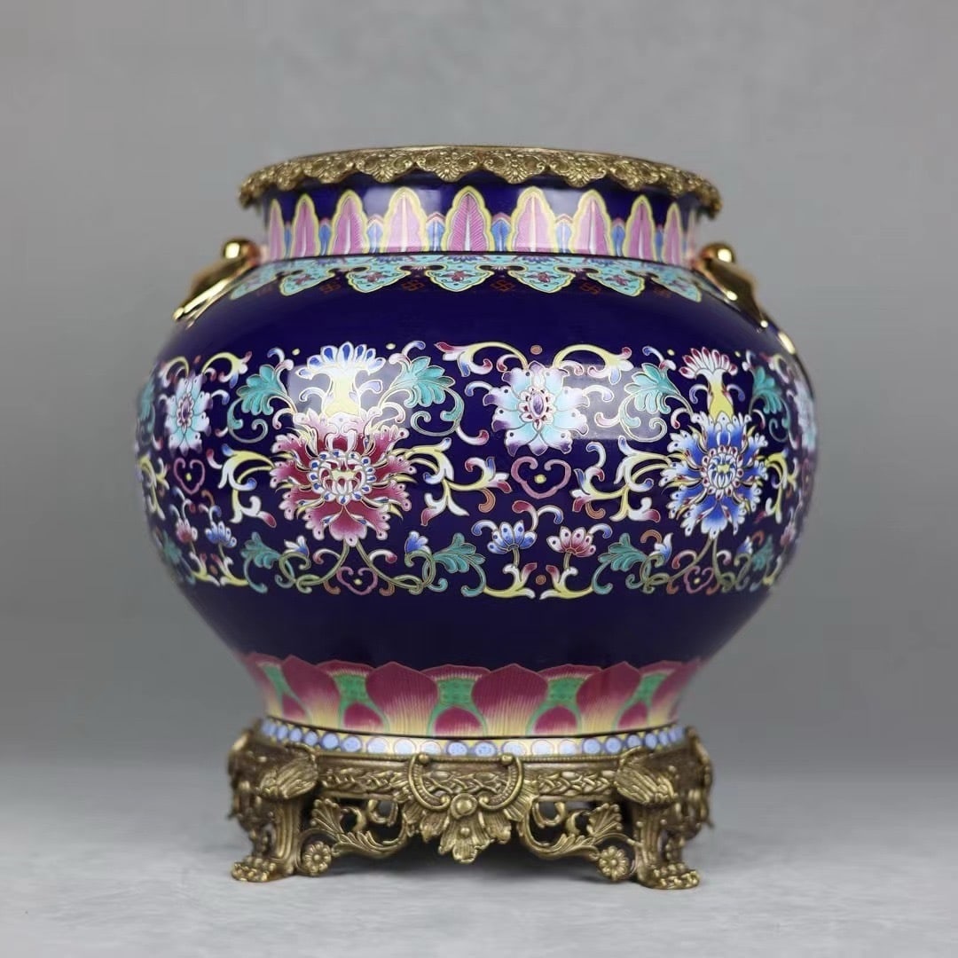 A Rare Ji Blue Glazed Famille-Rose Inlaid Bronze Lotus Pattern Double-Ears Jar: A Rare Ji Blue Glazed Famille-Rose Inlaid Bronze Lotus Pattern Double-Ears Jar,Qing Dynasty,China,Qianlong Four-Character Mark,Size:12.2inx10.6in 霁蓝釉粉彩嵌໢