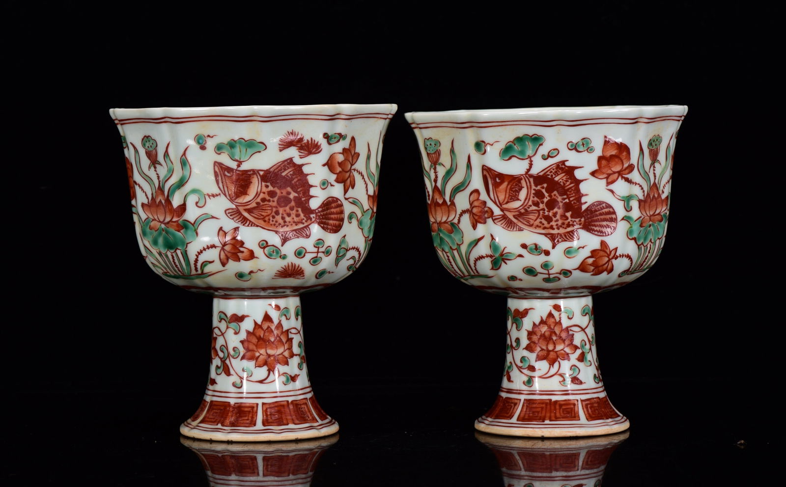 A Pair of Exquisite Red-and-Green Glazed Hornwort Pattern Stem Cups: A Pair of Exquisite Red-and-Green Glazed Hornwort Pattern Stem Cups,Ming Dynasty,China,Xuande Six-character Mark,Size:7.1inx6.3ins 一对红绿彩鱼藻纹ƌ