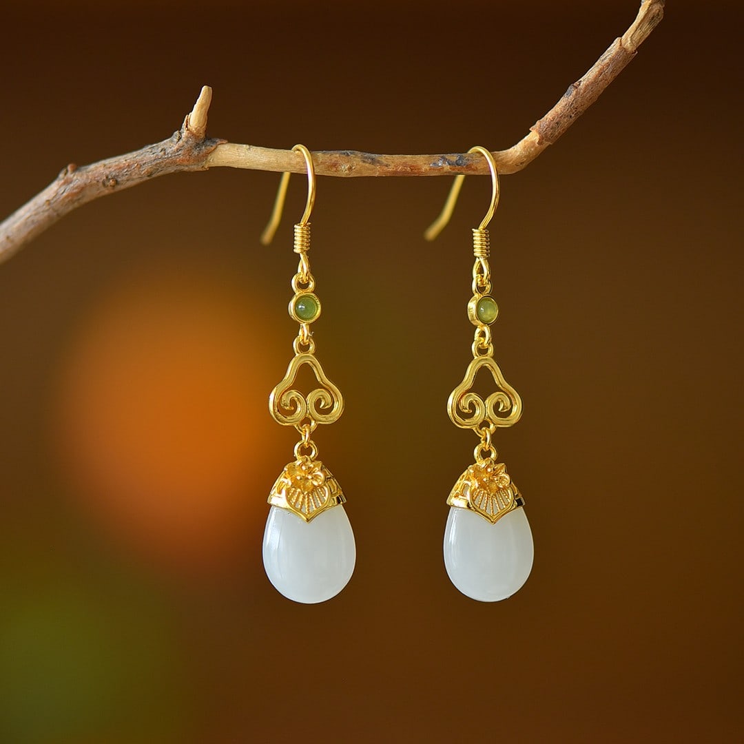 A Pair of Exquisite Sterling Silver-Gold Plated Inlaid White Jade Earrings: A Pair of Exquisite Sterling Silver-Gold Plated Inlaid White Jade Earrings,Size:0.4inx0.6in 一对纯银镀金镶白玉耳环