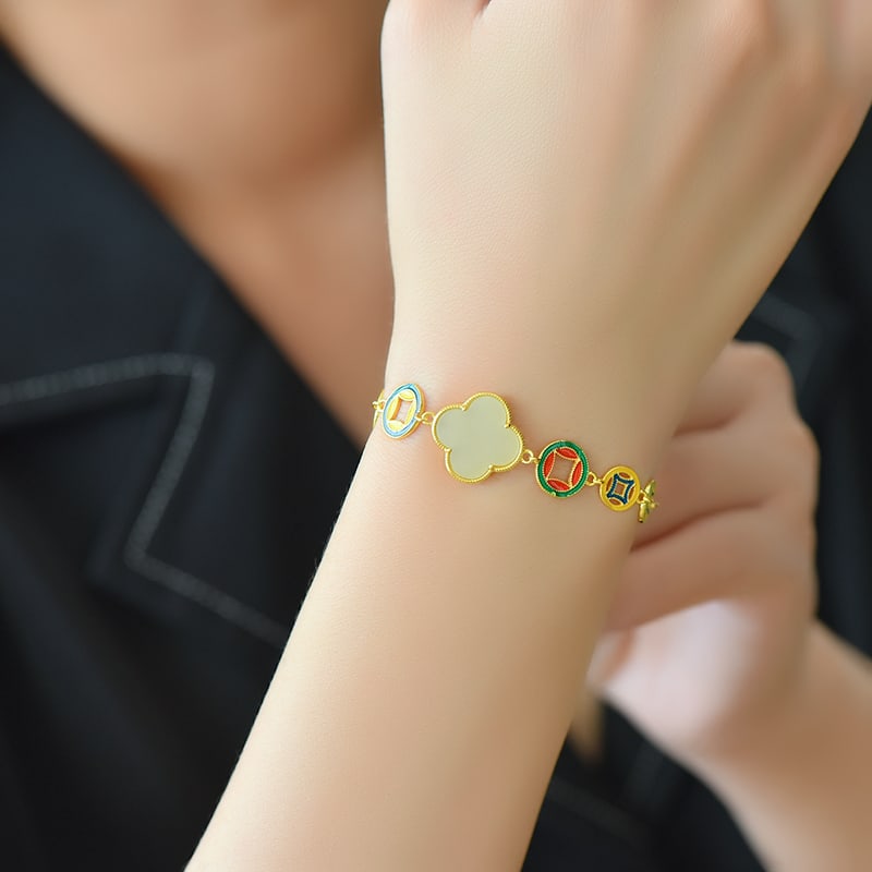 An Exquisite Sterling Silver-Gold Plated Inlaid White Jade Enamel Bracelet: An Exquisite Sterling Silver-Gold Plated Inlaid White Jade Enamel Bracelet 纯银镀金镶白玉珐琅手链