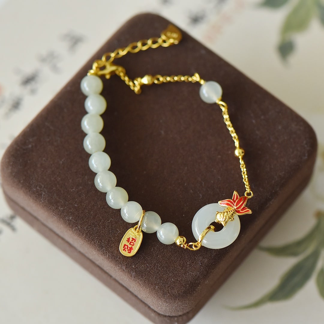 An Exquisite Sterling Silver-Gold Plated Inlaid White Jade Enamel Bracelet: An Exquisite Sterling Silver-Gold Plated Inlaid White Jade Enamel Bracelet,Size:0.5inx0.6in 纯银镀金镶白玉珐琅手链