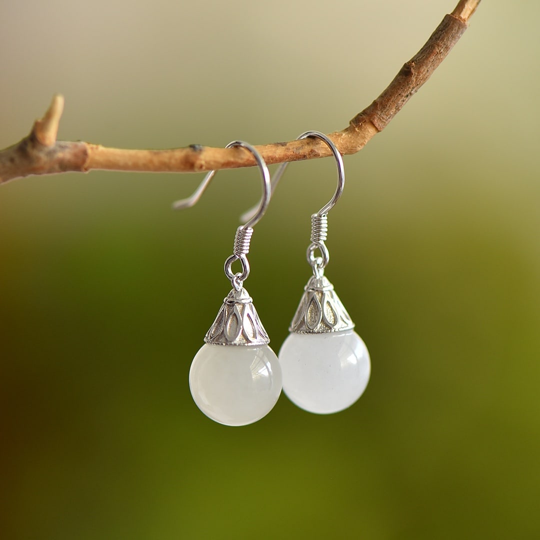 A Pair of Exquisite Sterling Silver Inlaid White Jade Earrings: A Pair of Exquisite Sterling Silver Inlaid White Jade Earrings,Size:0.4inmm 一对纯银镶白玉耳环