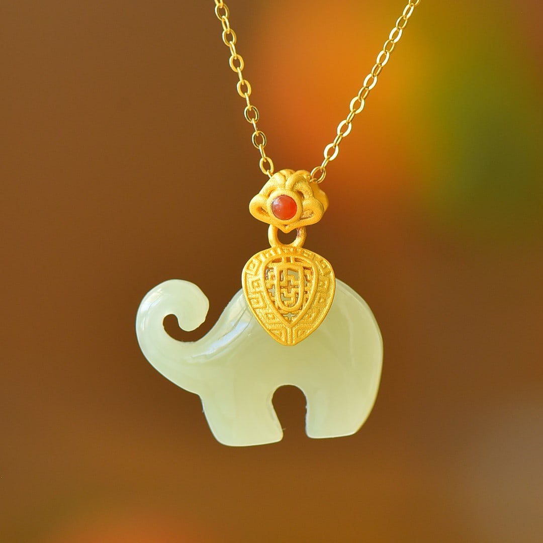 An Exquisite Sterling Silver-Gold Plated Inlaid White Jade Pendant: An Exquisite Sterling Silver-Gold Plated Inlaid White Jade Pendant,Size:0.6inx0.9in 纯银镀金镶白玉吊坠