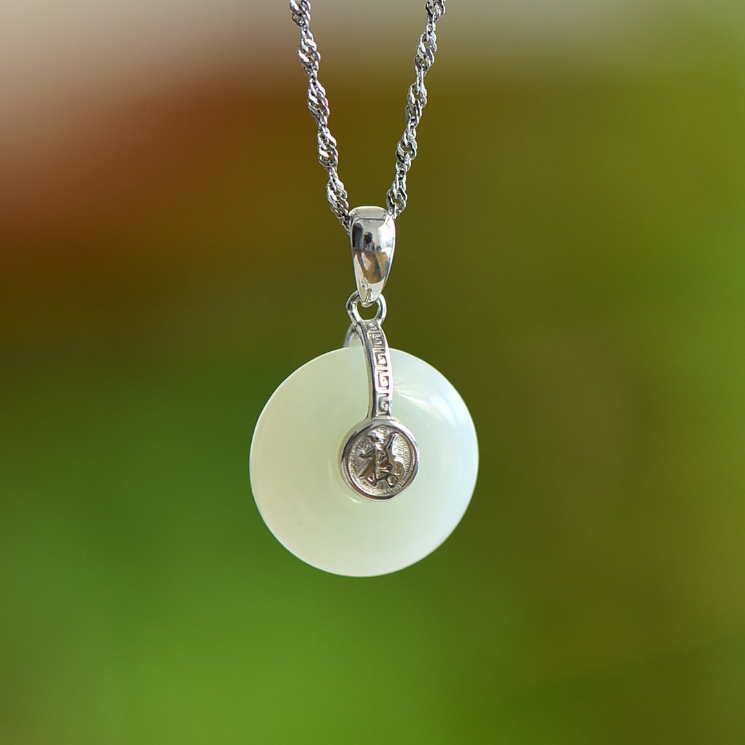 An Exquisite Sterling Silver Inlaid White Jade Pendant: An Exquisite Sterling Silver Inlaid White Jade Pendant,Size:0.6inx0.6in 纯银镶白玉吊坠