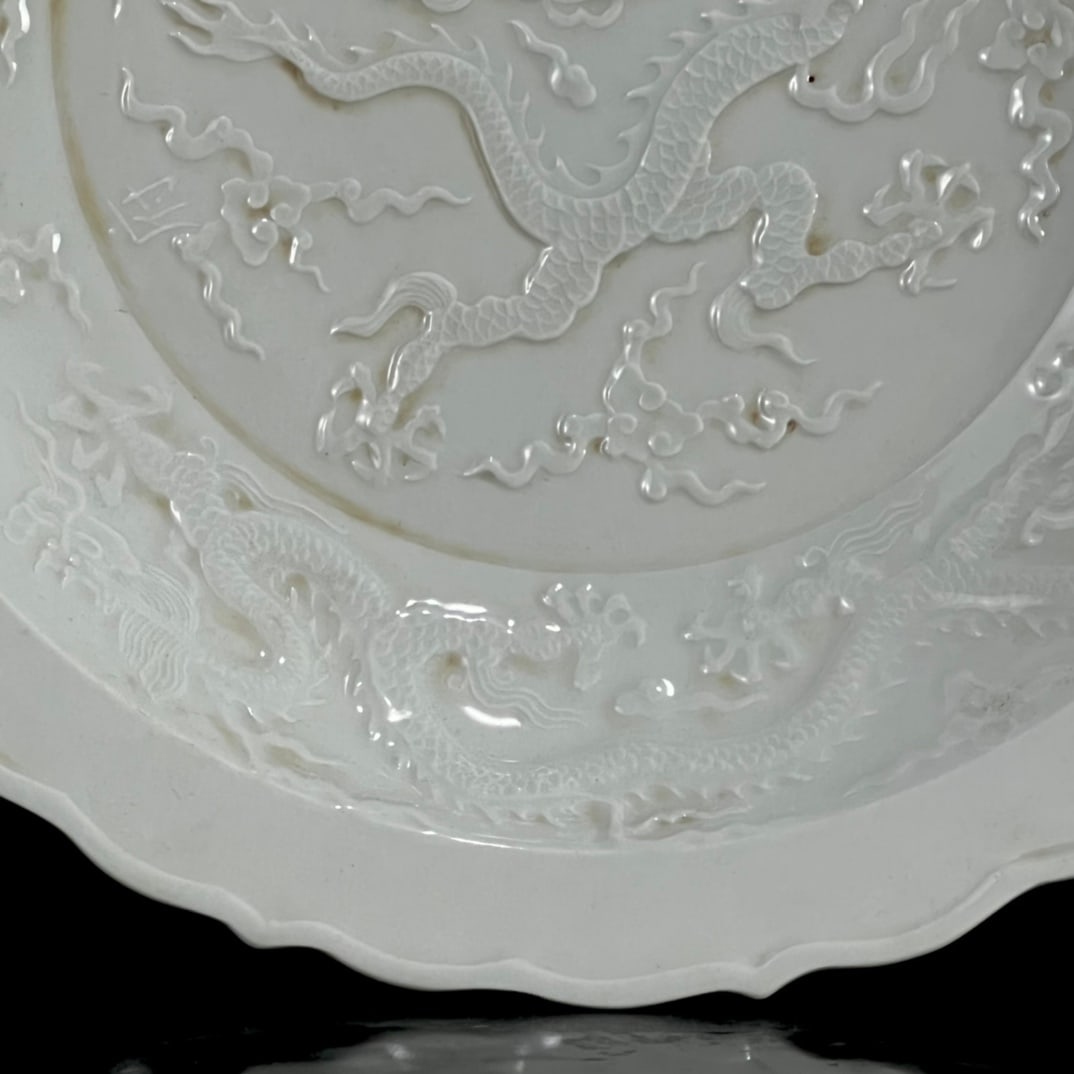 A Rare White Glazed Auspicious Cloud and Dragon Pattern Plate - 4