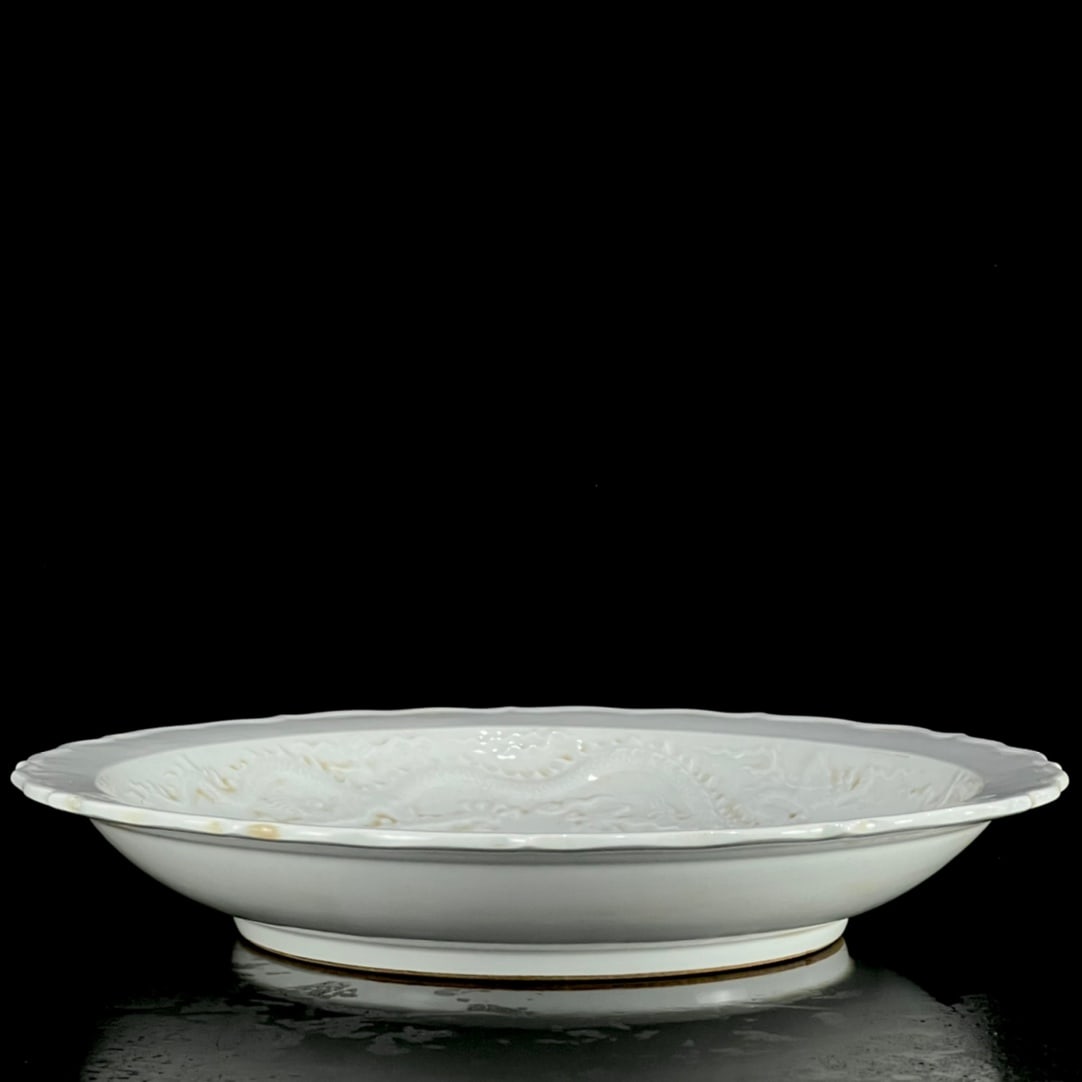 A Rare White Glazed Auspicious Cloud and Dragon Pattern Plate - 8