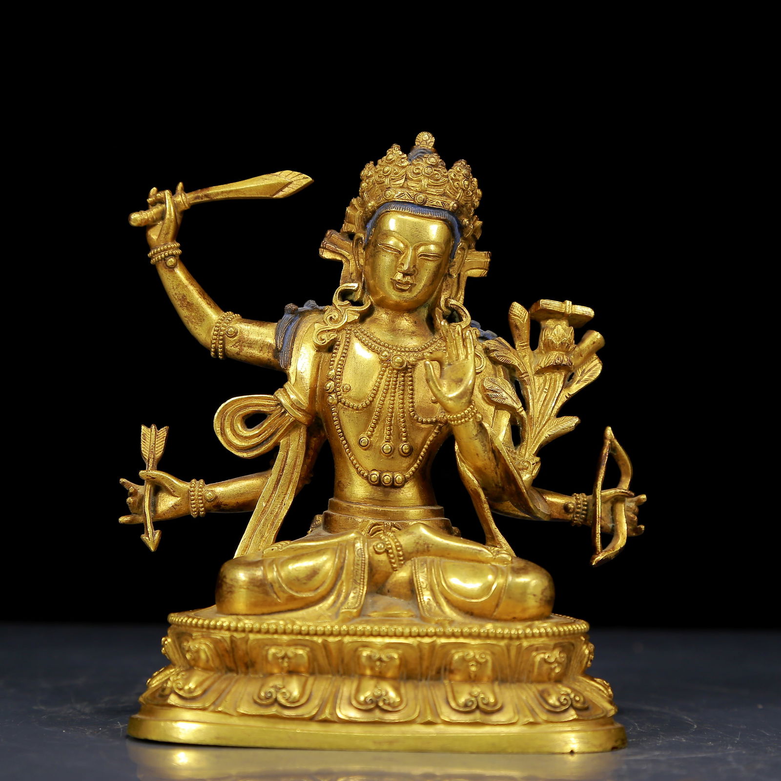 A Solemn Gilt Bronze Statue of Four-Armed Manjusri (1 of 5)