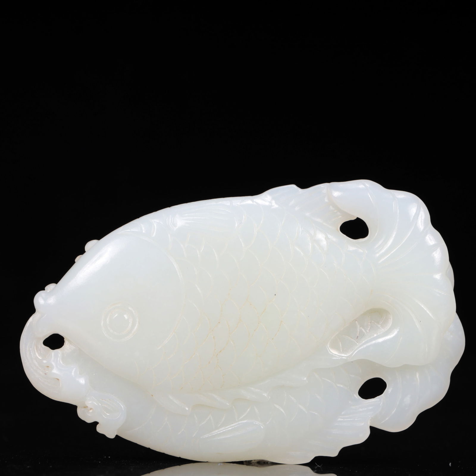 An Exquisite White Jade Fish Pendant (1 of 4)