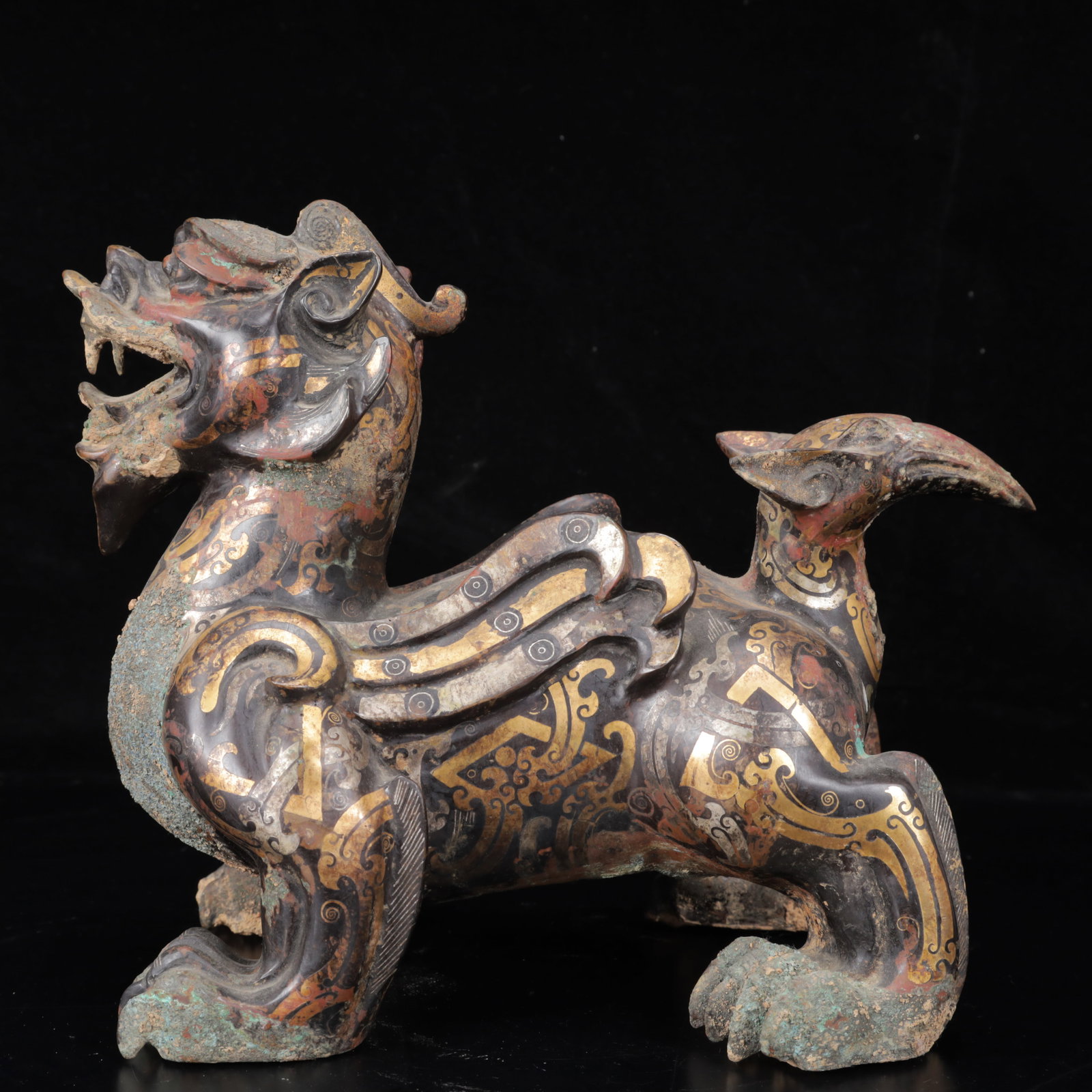 An Archaic Bronze Inlaid Gold and Silver Wealth-Attracting Creature Ornament: An Archaic Bronze Inlaid Gold and Silver Wealth-Attracting Creature Ornament,The Warring States period in China,Size:10.6inx9.8inx9.1in,Weight:4000g 
