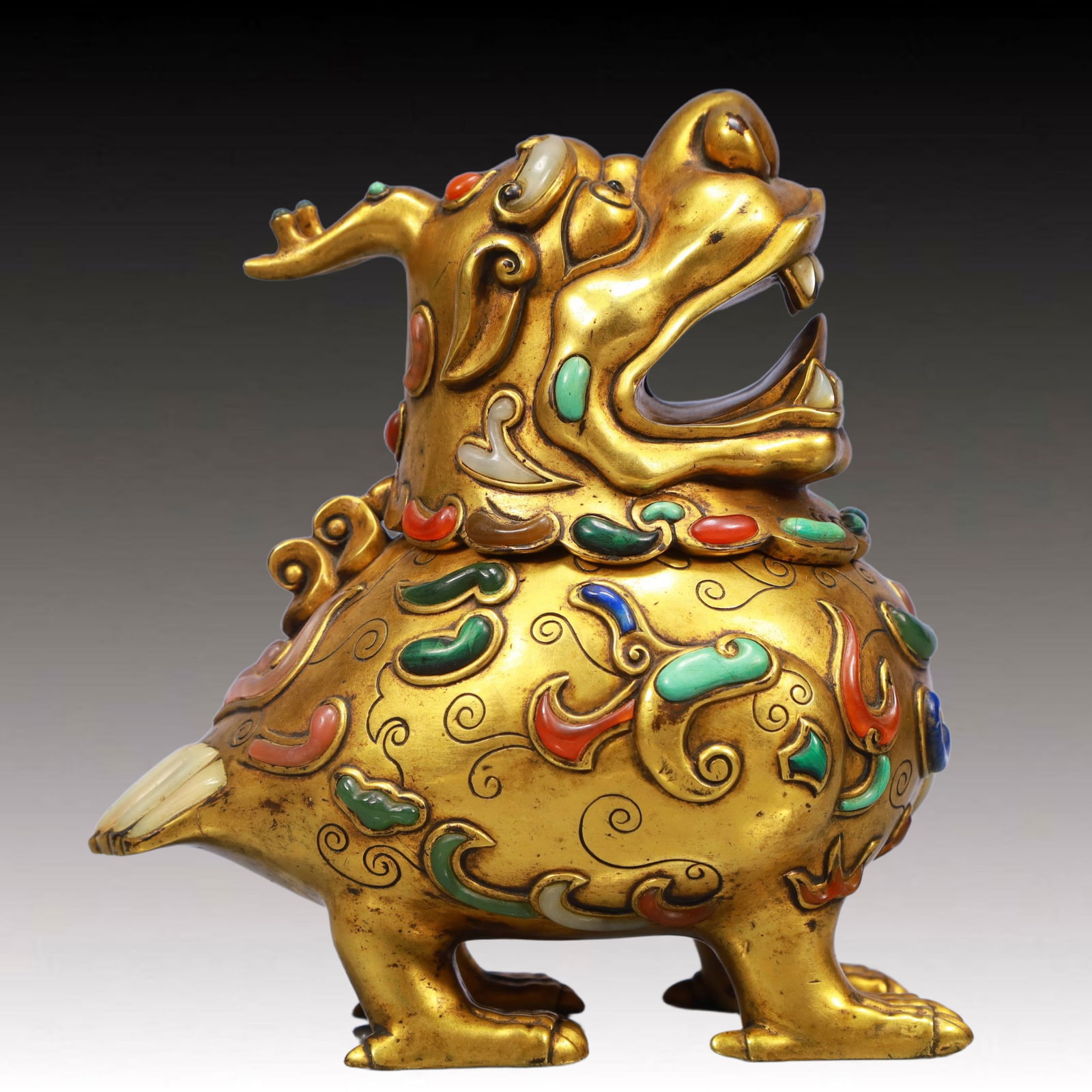 An Exquisite Gilt Bronze Auspicious Beast Censer, Inlaid Turquoise: An Exquisite Gilt Bronze Auspicious Beast Censer, Inlaid Turquoise,Qing Dynasty, China,Qianlong Four-character Mark,Size:6.7inx4.3inx7.9in,Weight:3200g 铜鎏金瑞兽香