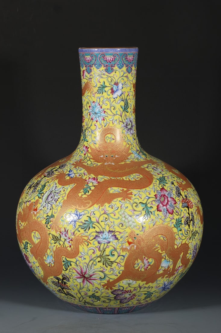 A Huge Enamel Iron-Red Yellow Ground Painted Gold Lotus and Dragon Pattern Vase: A Huge Enamel Iron-Red Yellow Ground Painted Gold Lotus and Dragon Pattern Vase,Qing Dynasty,China,Qianlong Four-character Mark,Size:20.7inx15.2in 