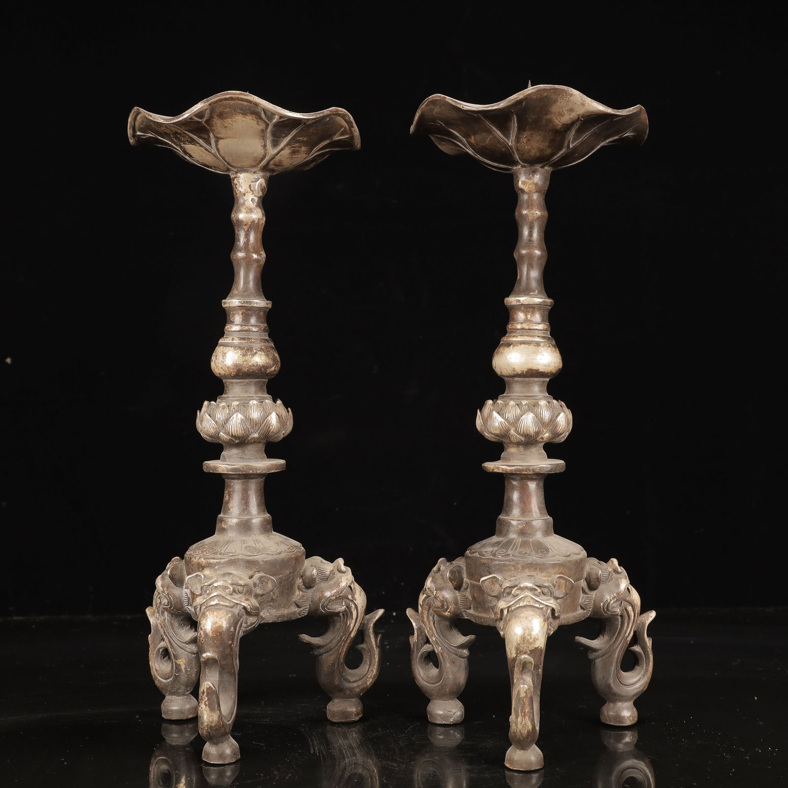 A Pair of Rare Silver Lotus Pattern Beast-legs Candlesticks: A Pair of Rare Silver Lotus Pattern Beast-legs Candlesticks,Qing Dynasty, China,Size:5.5inx5.5inx13.8in,Weight:330g 一对银莲花纹兽足烛台,