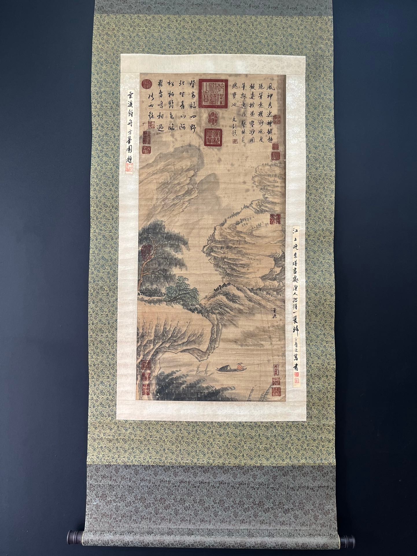 A Chinese Vertical Scroll Ink Painting of Landscape and Figure on Paper,Dong Yuan: A Chinese Vertical Scroll Ink Painting of Landscape and Figure on Paper,Dong Yuan,Size:20.1inx35.4in 一幅中国水墨山水人物画立