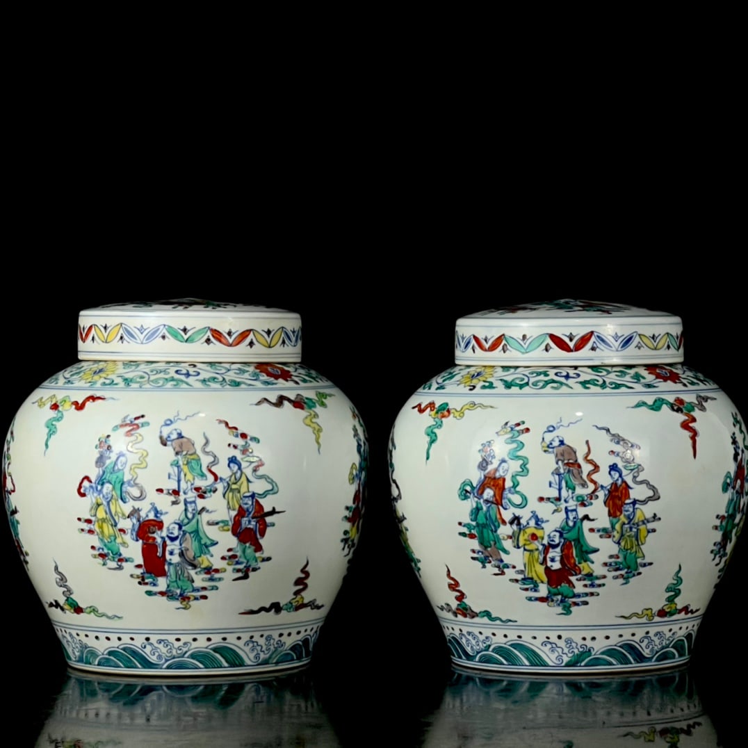 A Pair of Exquisite Doucai Auspicious Cloud and Figure Pattern Cover Jars (1 of 9)