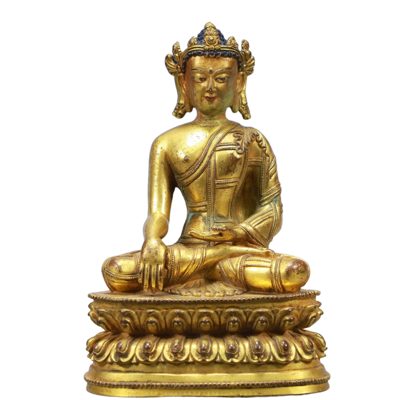 A Solemn Gilt Bronze Statue of Sakyamuni: A Solemn Gilt Bronze Statue of Sakyamuni ,Ming Dynasty, China,Size:5.5inx4.3inx8.3in Weight:2150g 铜鎏金释迦牟尼像,中国明代