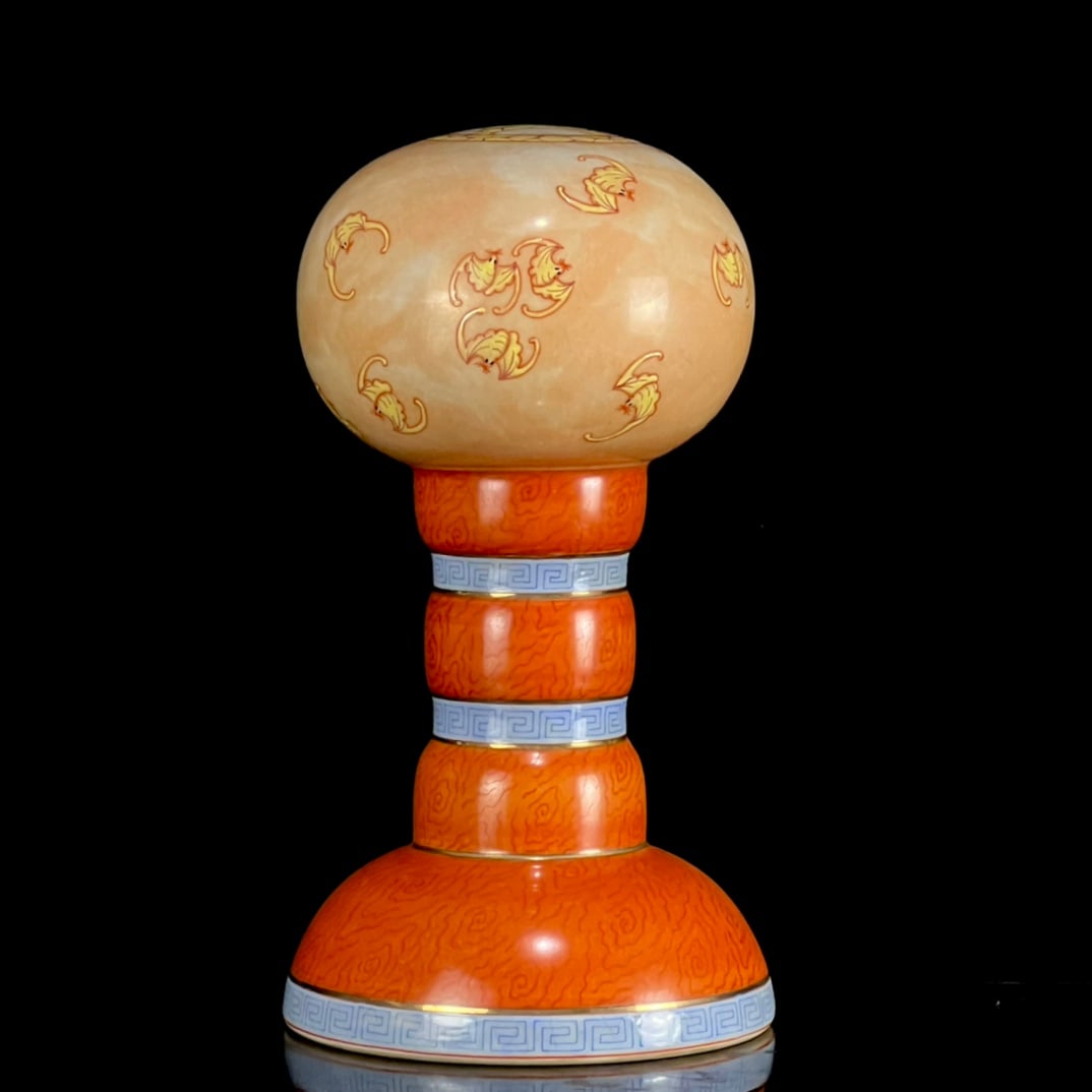 An Exquisite Iron-Red Glazed Famille-Rose Painted Gold Bats Pattern Hatstand: An Exquisite Iron-Red Glazed Famille-Rose Painted Gold Bats Pattern Hatstand,Qing Dynasty, China,Qianlong Six-character Mark,Size:10.2inx5.7in 