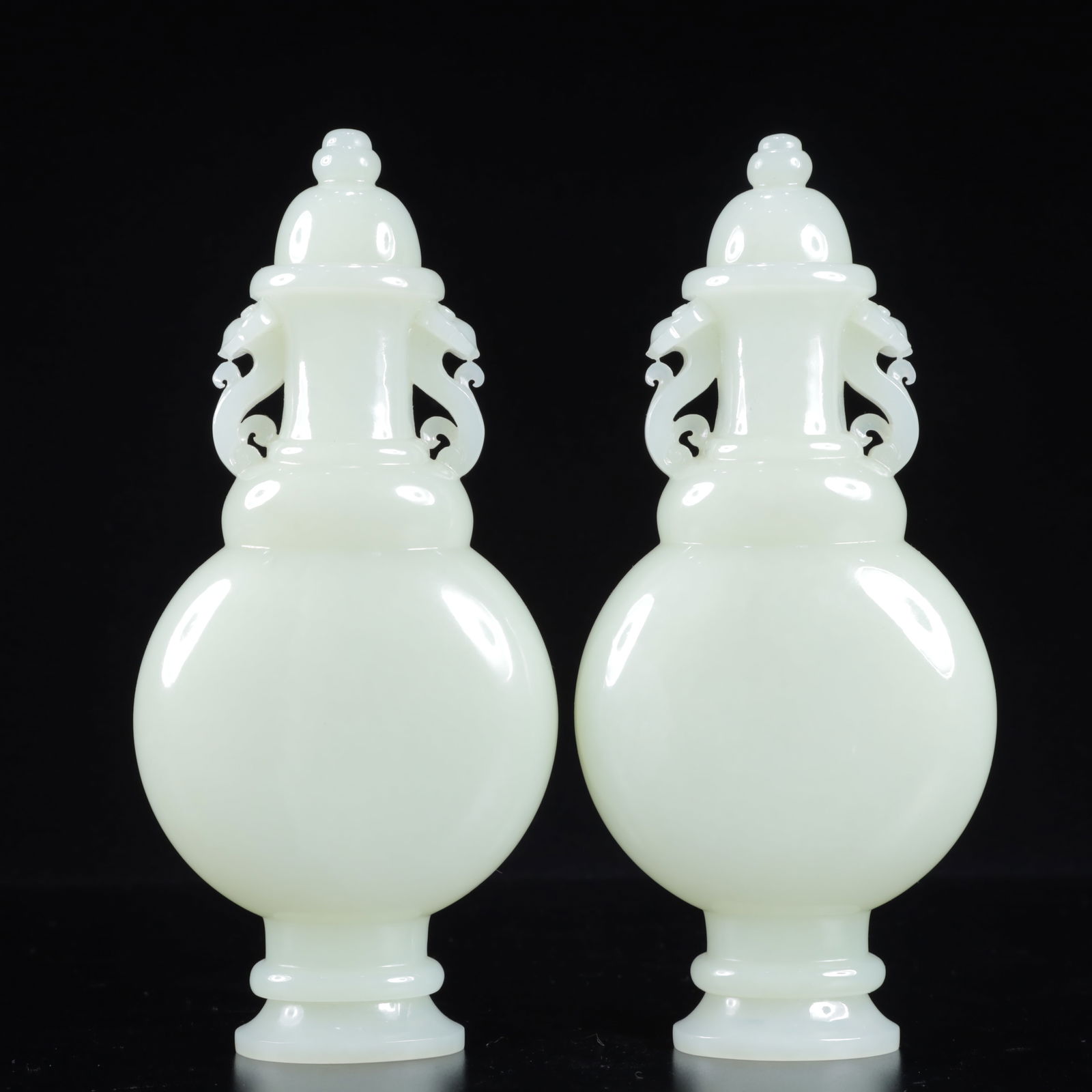 A Pair of Exquisite White Jade Double-Ears Vases: A Pair of Exquisite White Jade Double-Ears Vases,Qing Dynasty, China,Qianlong Four-character Mark,Size:3.1inx1.4inx6.3in,Weight:600g 
