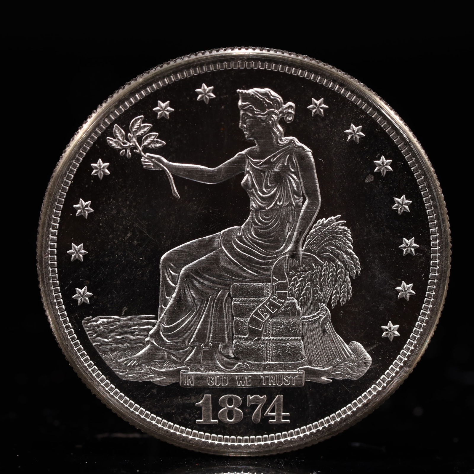 USA Trade Dollar 1874 Coin: American coin. Obverse: Liberty seated on a pedestal facing the sea to the left holding olive branches surrounded by 13 stars. IN GOD WE TRUST / LIBERTY / 1874. Reverse: An eagle holding branches