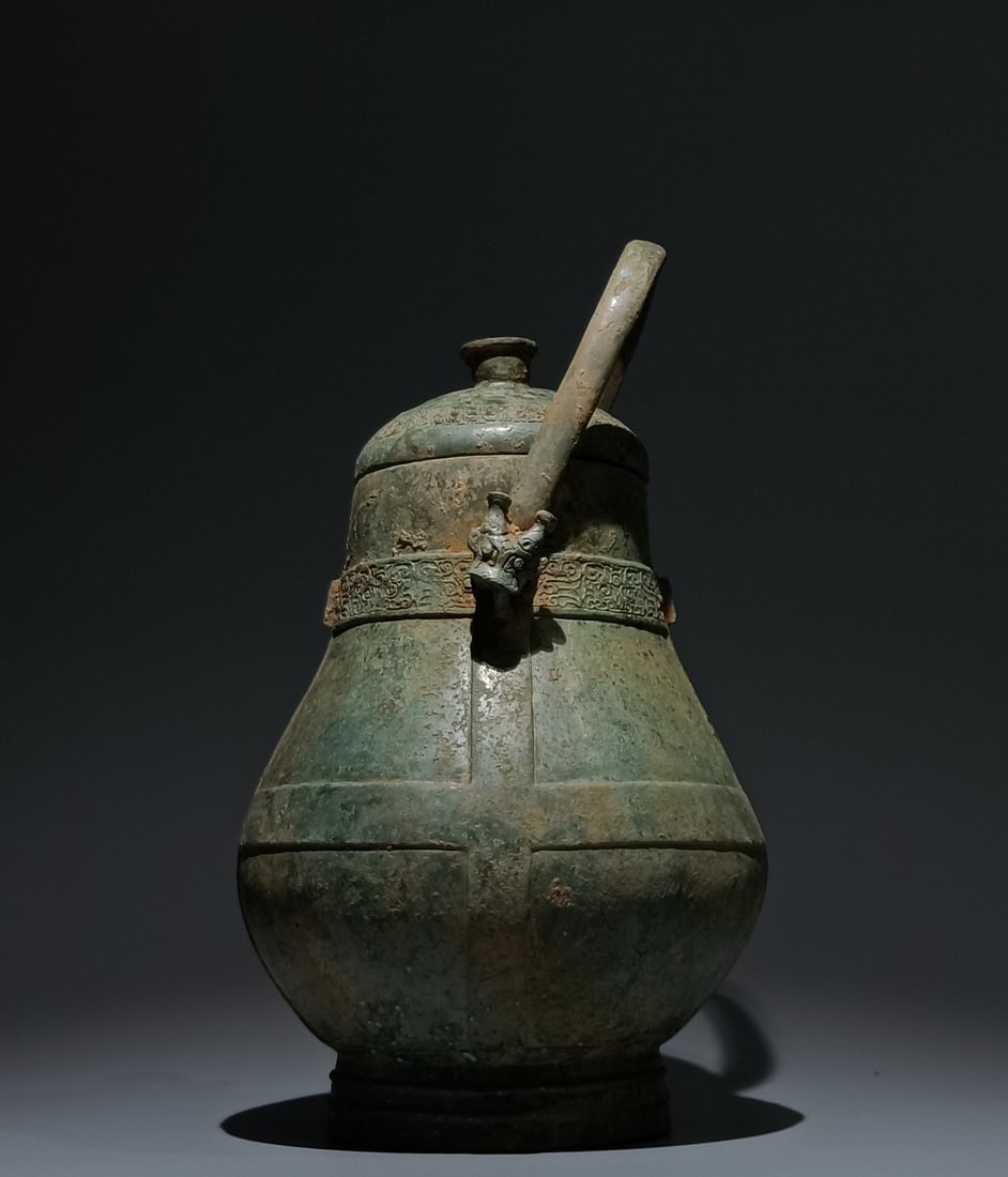 An Archaic Bronze Beast-Face Pattern Ewer - 3