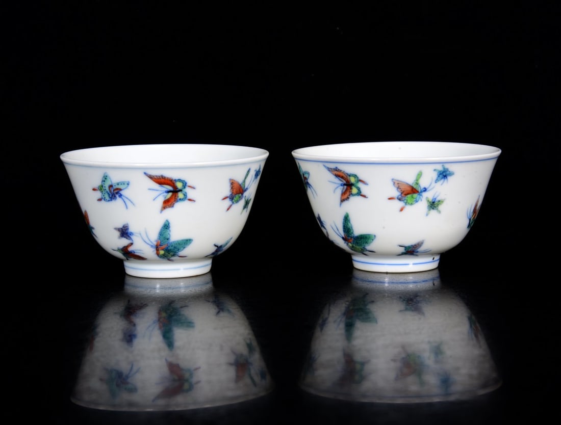 A Pair of Exquisite Doucai Butterfly Pattern Cups: A Pair of Exquisite Doucai Butterfly Pattern Cups,Qing Dynasty, China,Yongzheng Six-character Mark,Size:1.8inx3in 