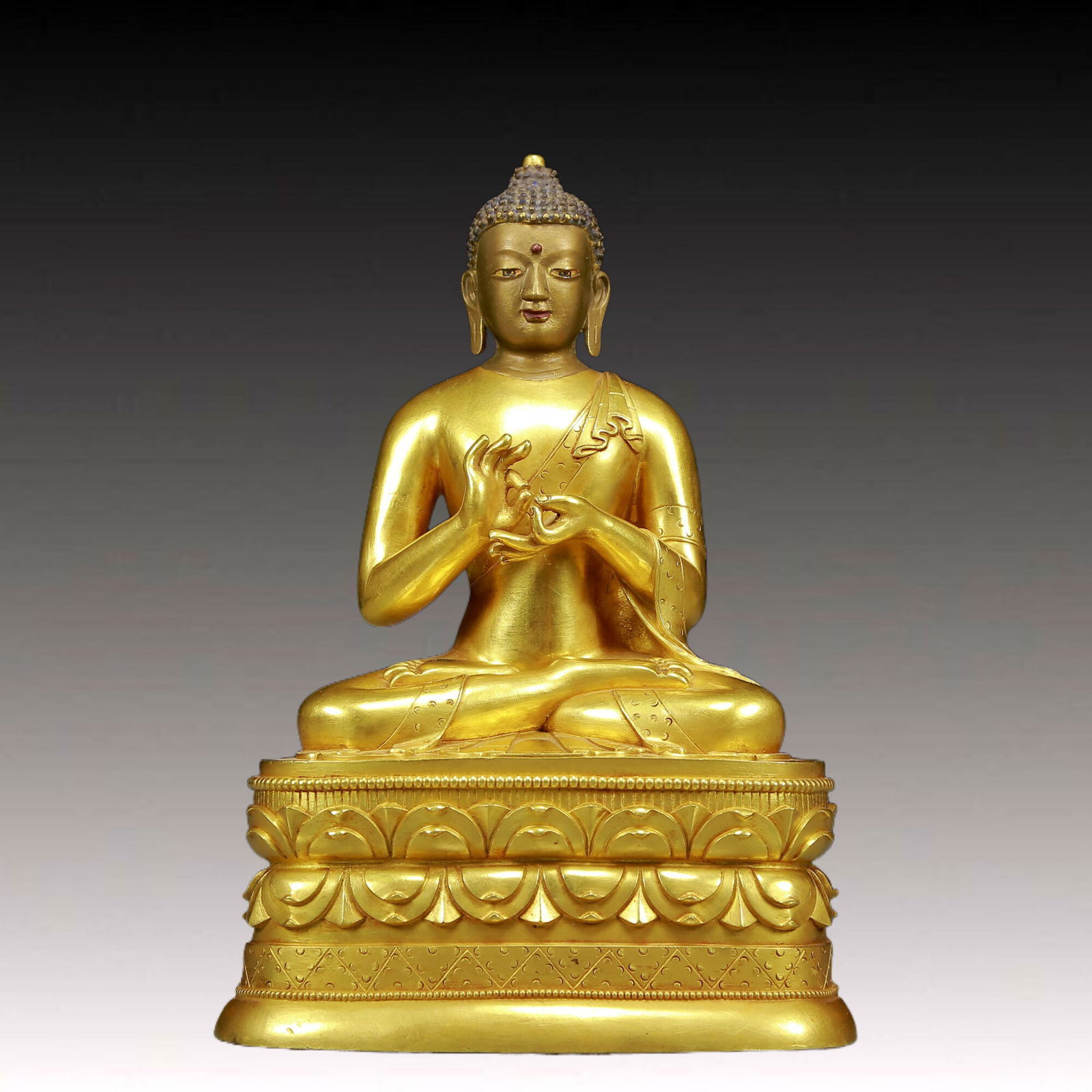 A Solemn Gilt Bronze Statue of Sakyamuni: A Solemn Gilt Bronze Statue of Sakyamuni,Ming Dynasty, China,Size:5.9inx3.9inx8.7in,Weight:2480g 铜鎏金释迦摩尼像，明代