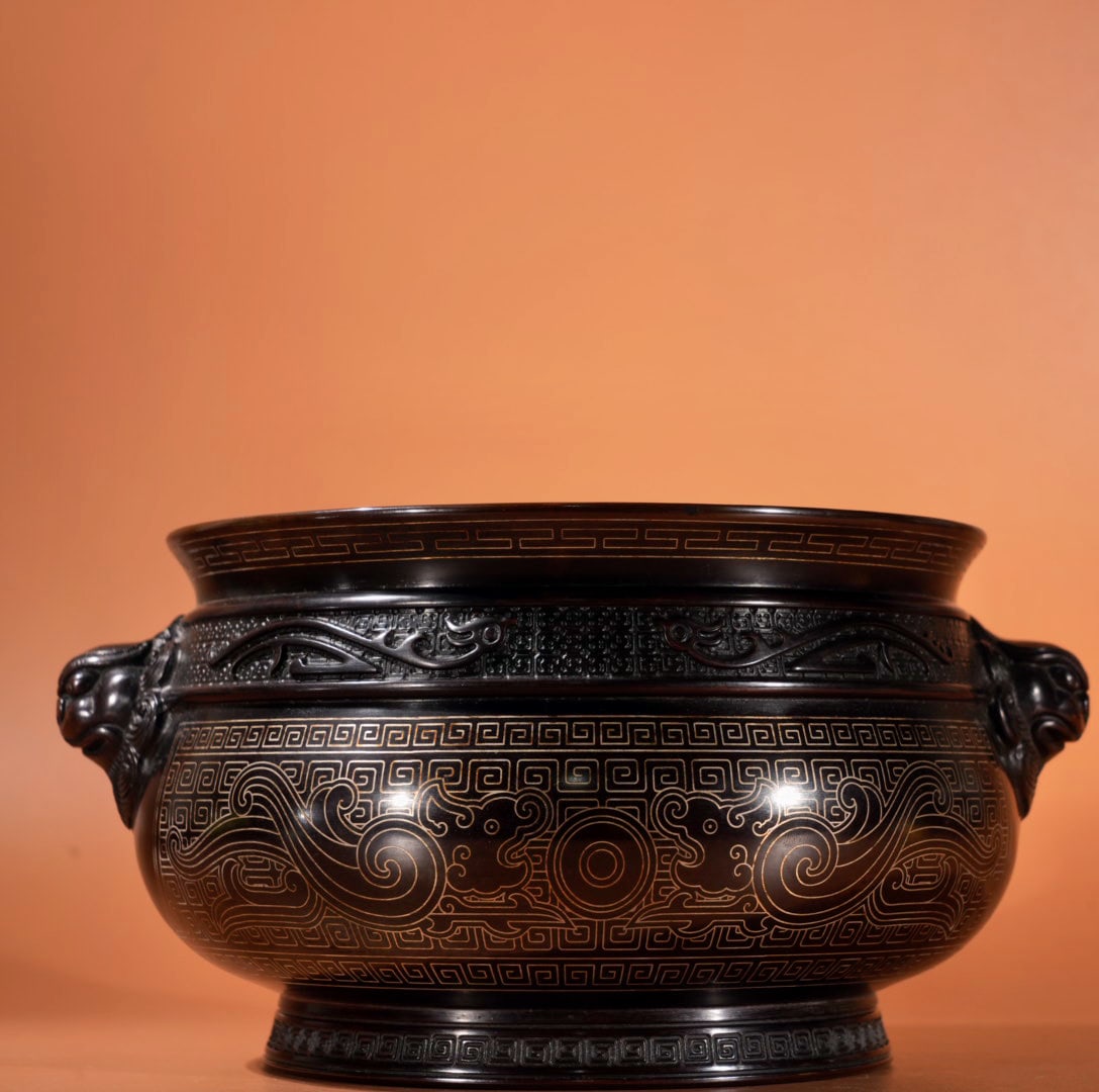 An Exquisite Bronze Inlaid Silver Phoenix Pattern Lion-Ears Censer: An Exquisite Bronze Inlaid Silver Phoenix Pattern Lion-Ears Censer,Qing Dynasty, China,With Mark,Size:3.7inx5.7in,Weight:2815g 