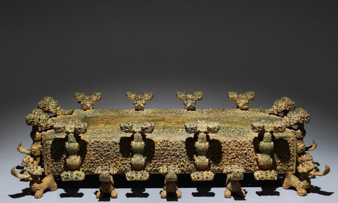 An Archaic Bronze Hollow Auspicious Cloud Pattern Ornament,With Inscription (1 of 15)