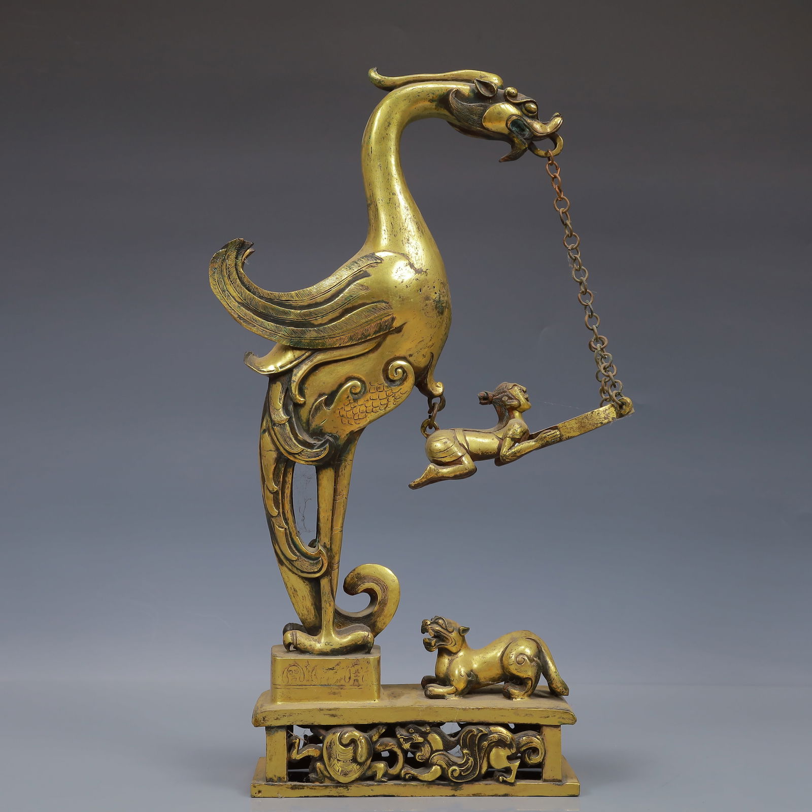 A Huge Auspicious Beast Candlestick,With Inscription: A Huge Auspicious Beast Candlestick,With Inscription,Qing Dynasty, China,Size:9.4inx2.8inx15.7in,Weight:3750g 