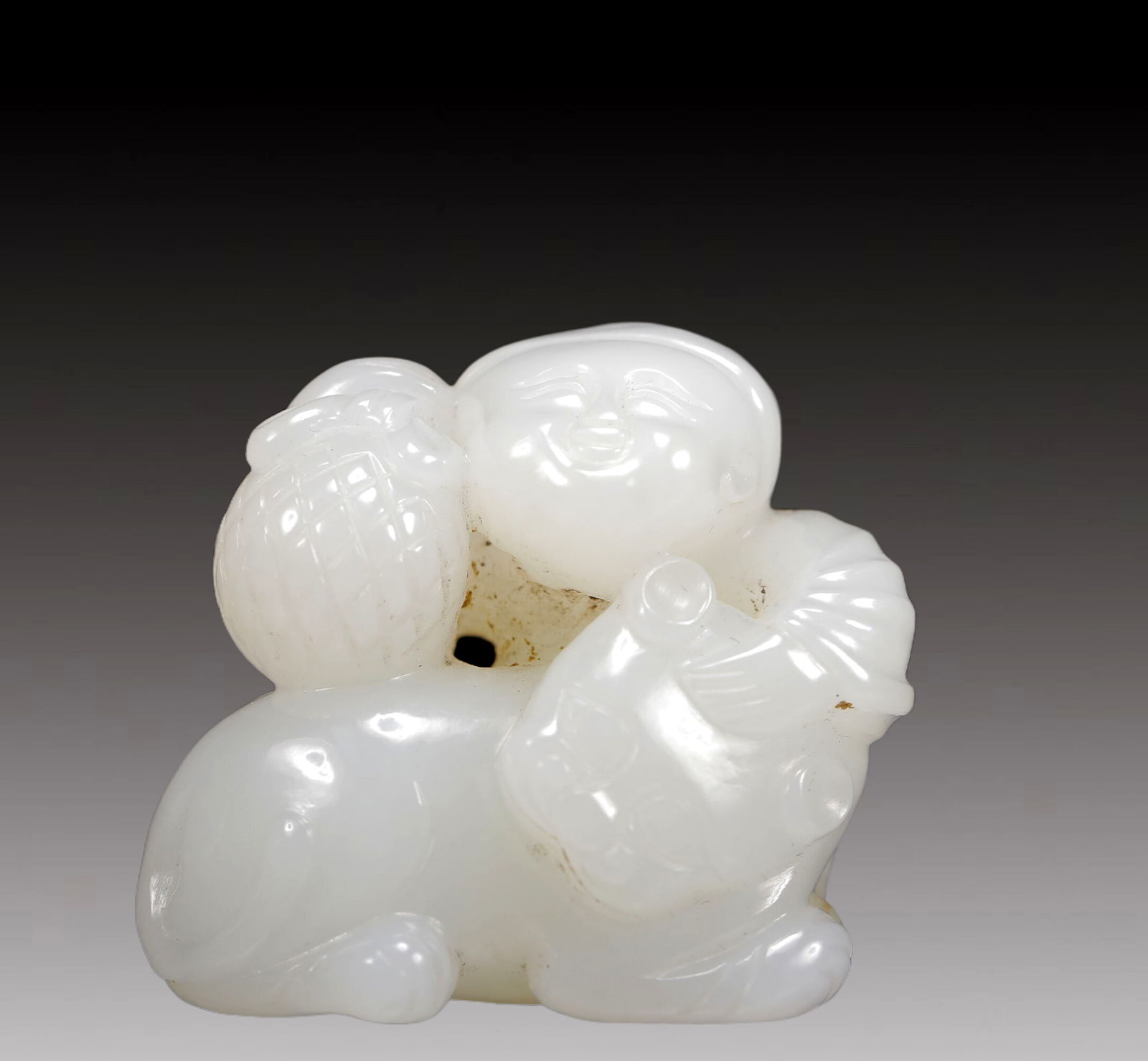 An Exquisite White Jade Figure and Beast Ornament (1 of 5)