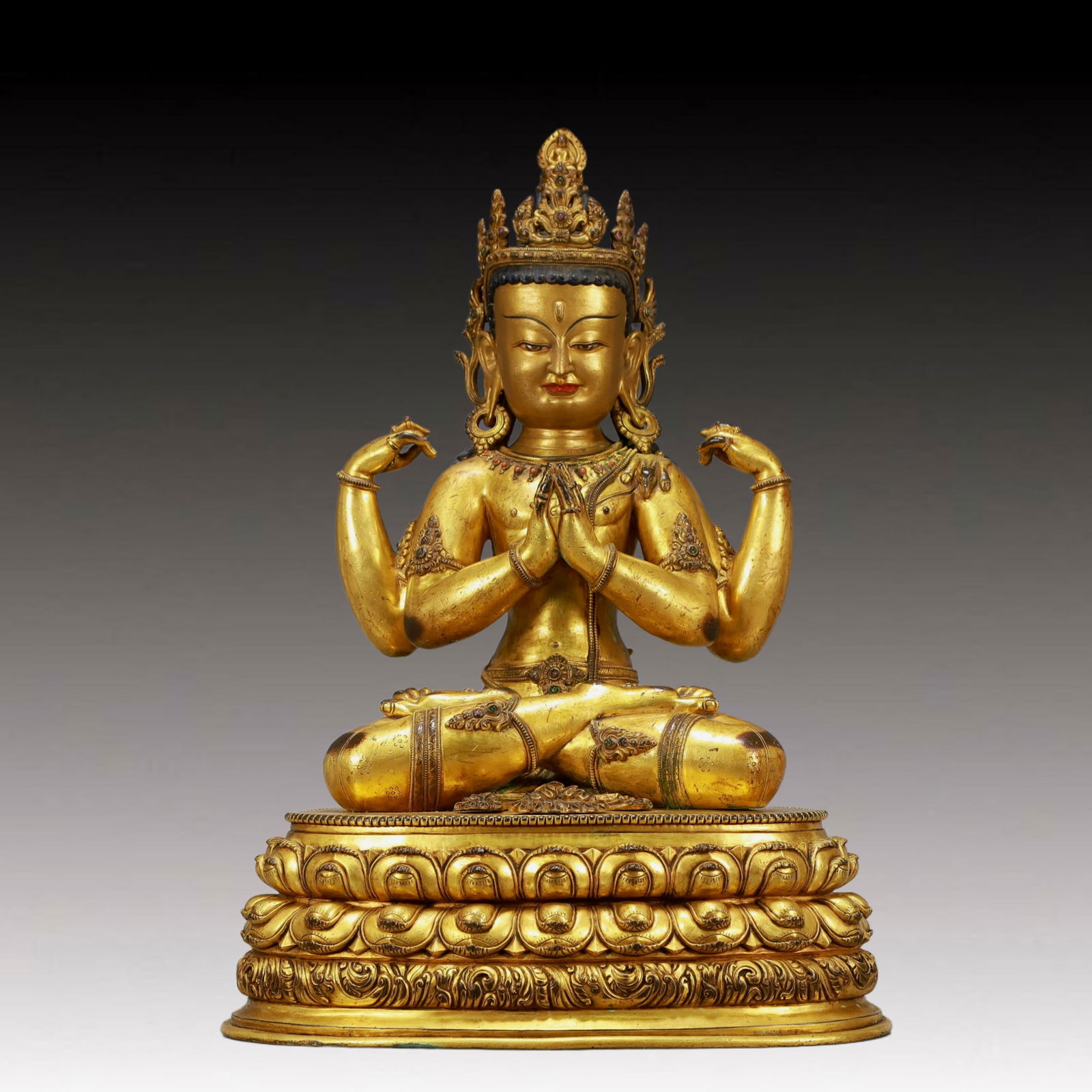 A Solemn Gilt Bronze Statue of Four-arms Guanyin: A Solemn Gilt Bronze Statue of Four-arms Guanyin ,Ming Dynasty, China,Size:11inx8.7inx16.9in,Weight:9950g 