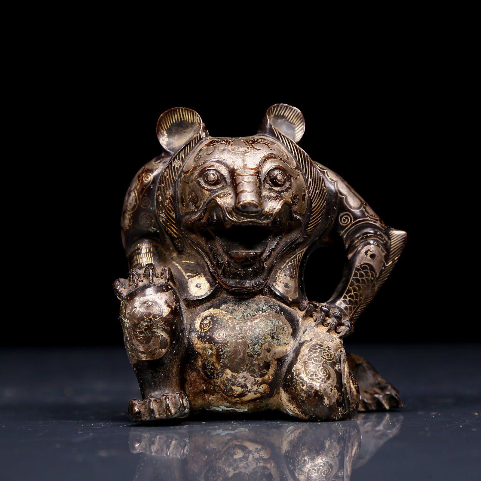 A Rare Bronze Inlaid Gold and Silver Bear Ornament: A Rare Bronze Inlaid Gold and Silver Bear Ornament,Ancient Time, China,Size:2.8inx2inx3.3in,Weight:125g 铜错金银熊摆件,远古时期